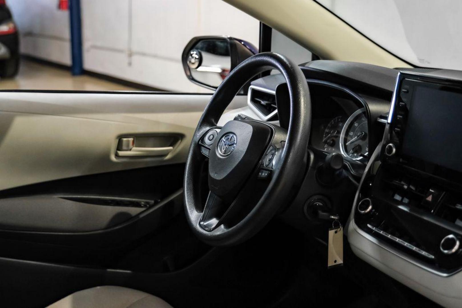 2022 Blueprint /Black/Blue Toyota Corolla LE (5YFEPMAE7NP) with an 1.8L I4 DOHC 16V engine, CVT transmission, located at 15300 Midway Rd., Addison, TX, 75001, (972) 702-0011, 32.958321, -96.838074 - Photo#12