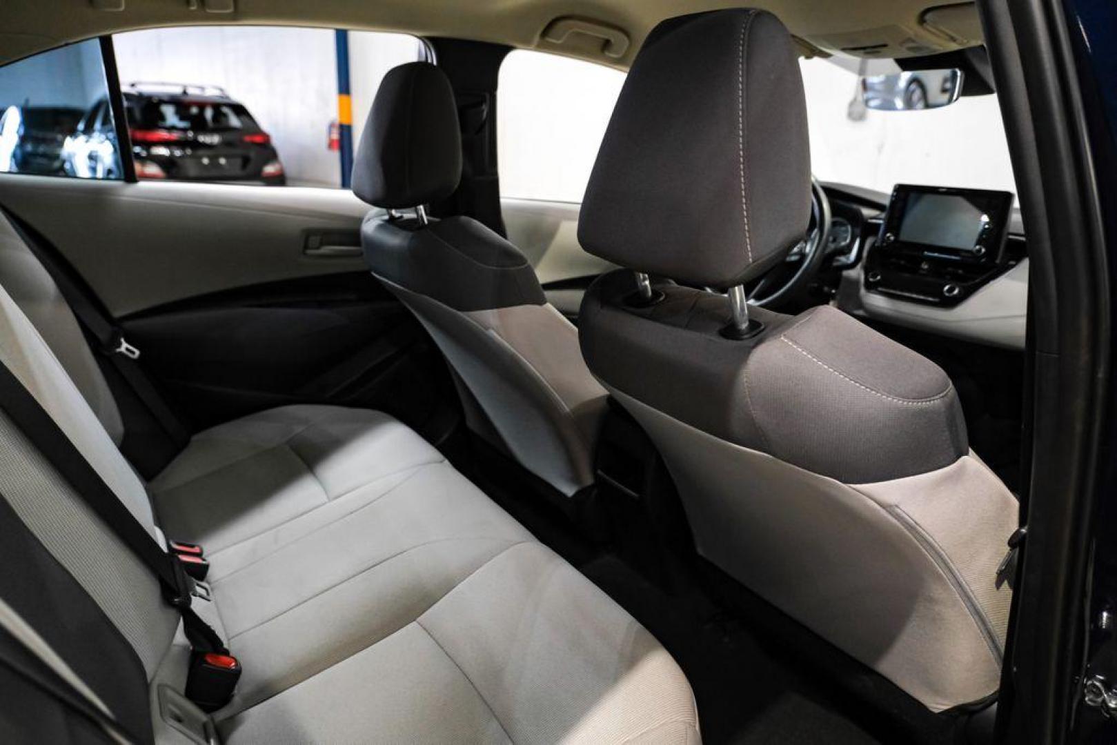 2022 Blueprint /Black/Blue Toyota Corolla LE (5YFEPMAE7NP) with an 1.8L I4 DOHC 16V engine, CVT transmission, located at 15300 Midway Rd., Addison, TX, 75001, (972) 702-0011, 32.958321, -96.838074 - Photo#33