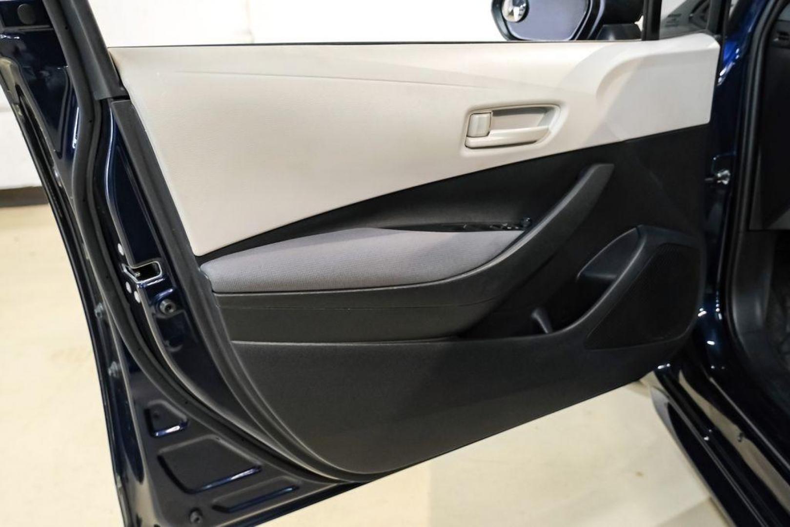 2022 Blueprint /Black/Blue Toyota Corolla LE (5YFEPMAE7NP) with an 1.8L I4 DOHC 16V engine, CVT transmission, located at 15300 Midway Rd., Addison, TX, 75001, (972) 702-0011, 32.958321, -96.838074 - Photo#36