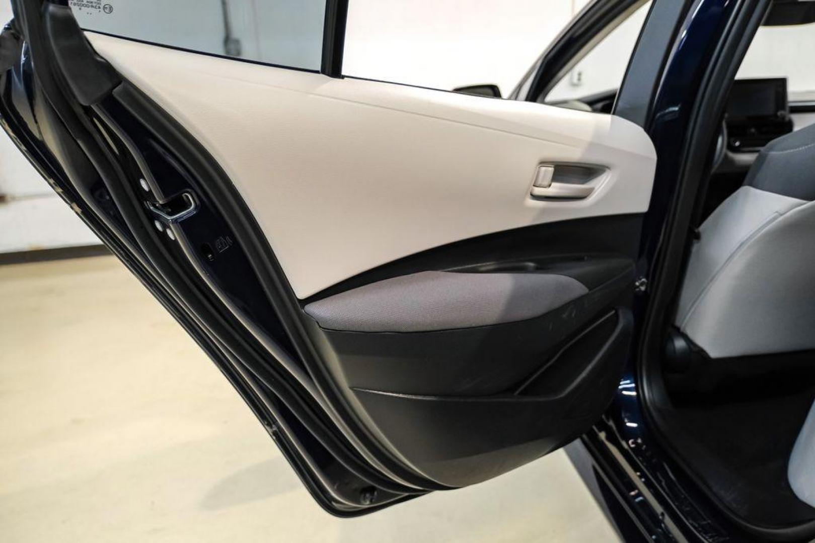 2022 Blueprint /Black/Blue Toyota Corolla LE (5YFEPMAE7NP) with an 1.8L I4 DOHC 16V engine, CVT transmission, located at 15300 Midway Rd., Addison, TX, 75001, (972) 702-0011, 32.958321, -96.838074 - Photo#39