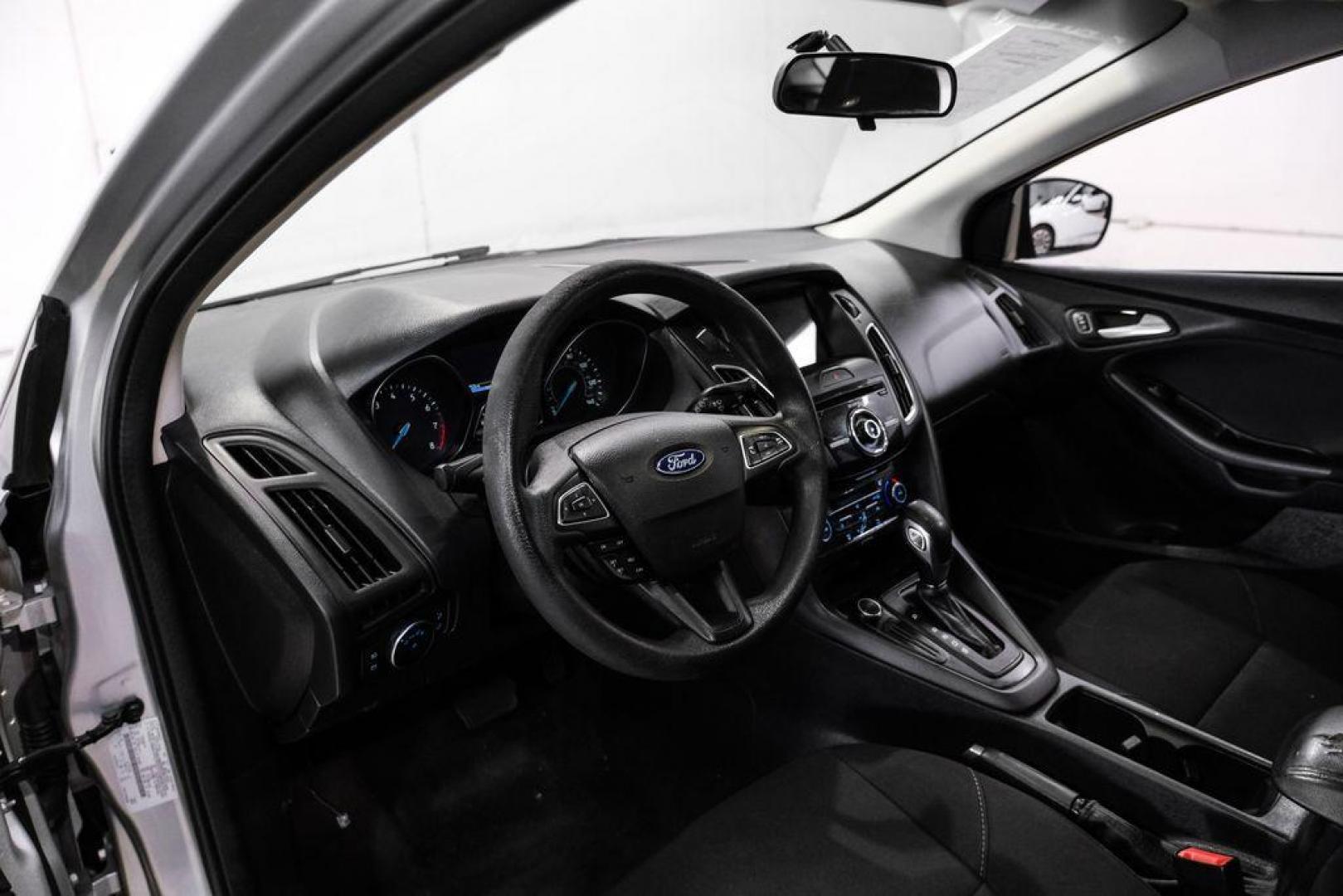 2017 Ingot Silver /Black Ford Focus SEL (1FADP3M23HL) with an 2.0L I4 GDI Ti-VCT Flex Fuel engine, Automatic transmission, located at 15300 Midway Rd., Addison, TX, 75001, (972) 702-0011, 32.958321, -96.838074 - Photo#2