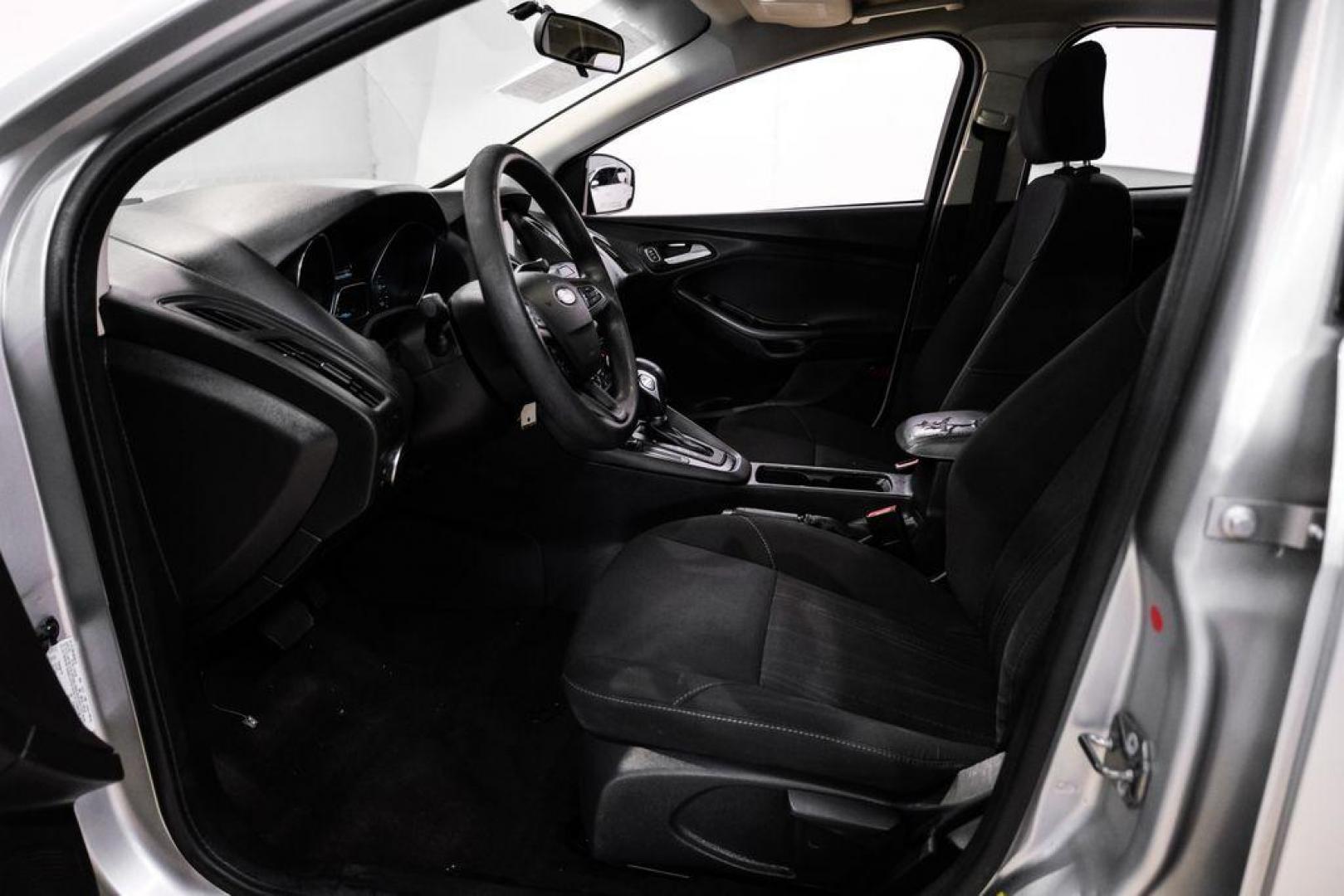 2017 Ingot Silver /Black Ford Focus SEL (1FADP3M23HL) with an 2.0L I4 GDI Ti-VCT Flex Fuel engine, Automatic transmission, located at 15300 Midway Rd., Addison, TX, 75001, (972) 702-0011, 32.958321, -96.838074 - Photo#3