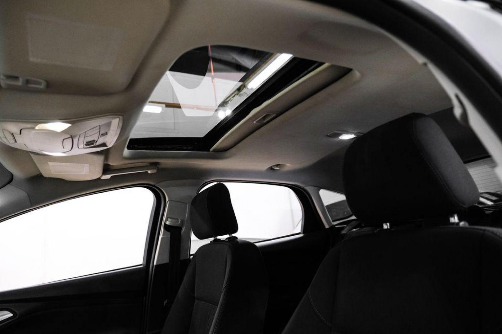 2017 Ingot Silver /Black Ford Focus SEL (1FADP3M23HL) with an 2.0L I4 GDI Ti-VCT Flex Fuel engine, Automatic transmission, located at 15300 Midway Rd., Addison, TX, 75001, (972) 702-0011, 32.958321, -96.838074 - Photo#4