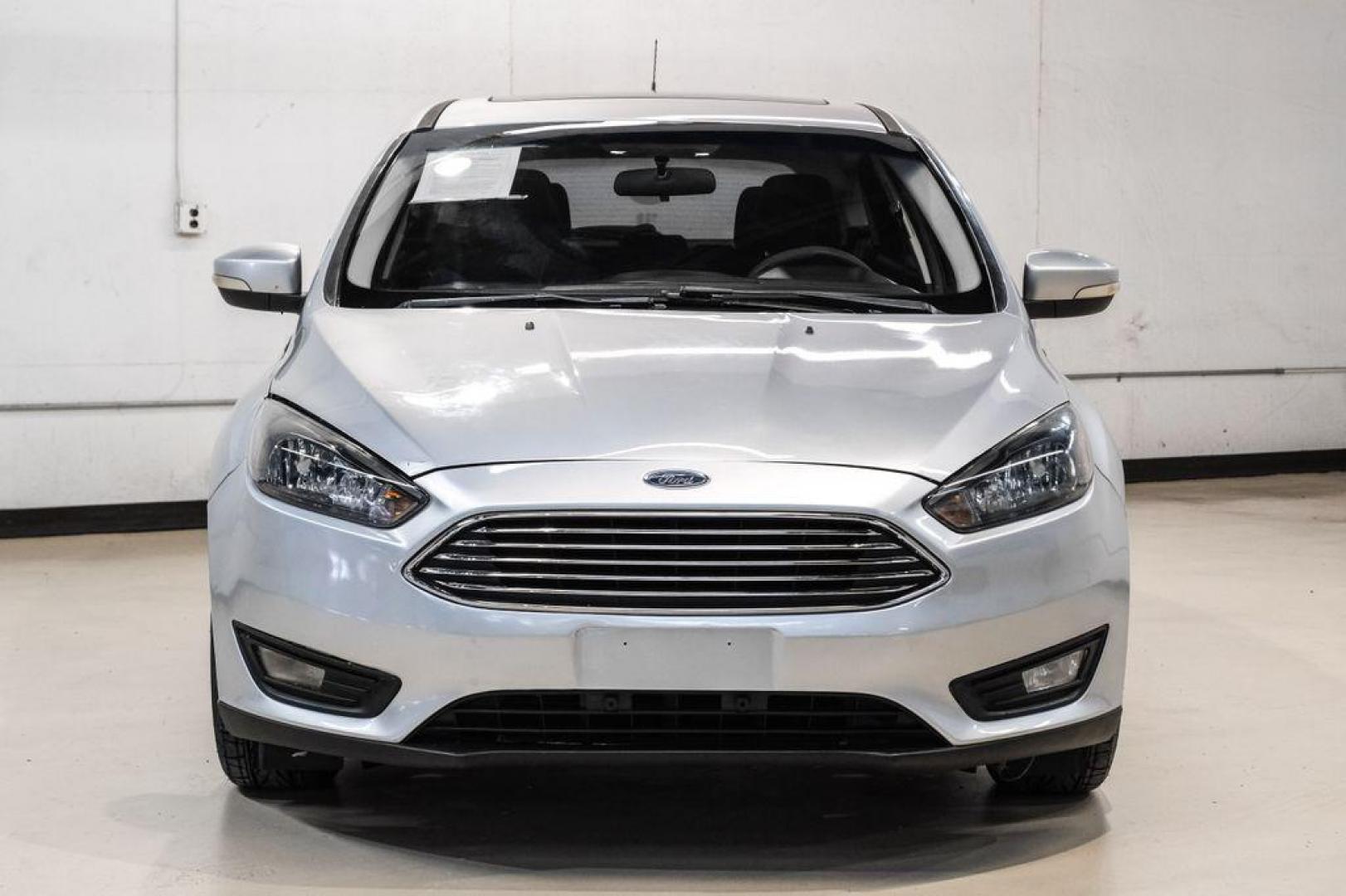 2017 Ingot Silver /Black Ford Focus SEL (1FADP3M23HL) with an 2.0L I4 GDI Ti-VCT Flex Fuel engine, Automatic transmission, located at 15300 Midway Rd., Addison, TX, 75001, (972) 702-0011, 32.958321, -96.838074 - Photo#5