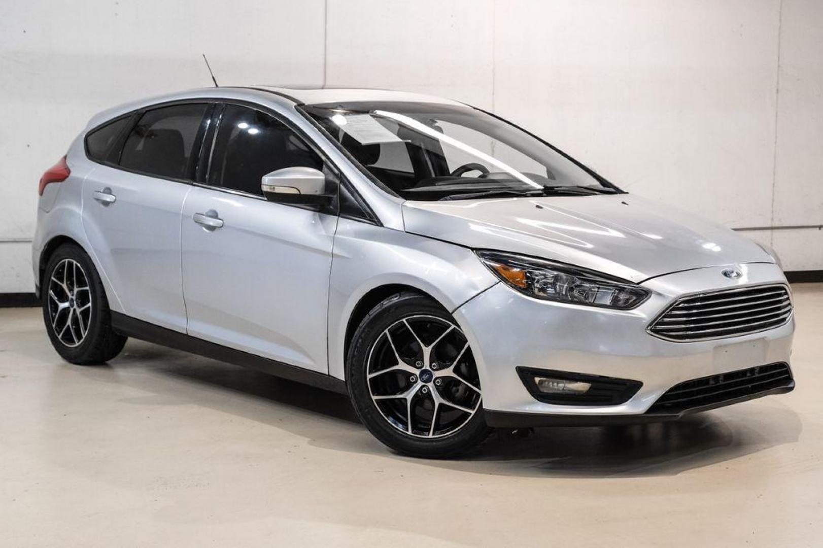 2017 Ingot Silver /Black Ford Focus SEL (1FADP3M23HL) with an 2.0L I4 GDI Ti-VCT Flex Fuel engine, Automatic transmission, located at 15300 Midway Rd., Addison, TX, 75001, (972) 702-0011, 32.958321, -96.838074 - Photo#6