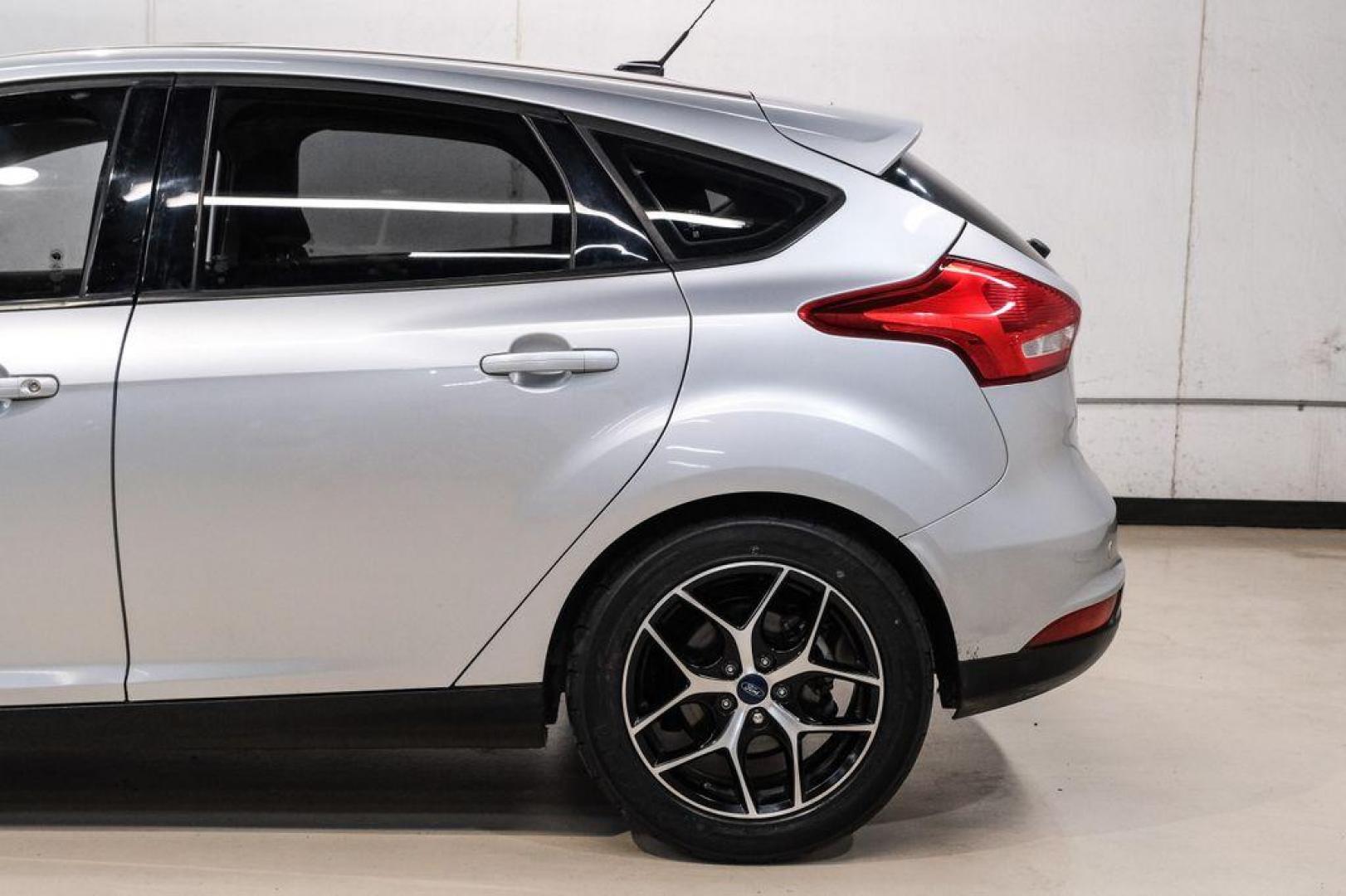 2017 Ingot Silver /Black Ford Focus SEL (1FADP3M23HL) with an 2.0L I4 GDI Ti-VCT Flex Fuel engine, Automatic transmission, located at 15300 Midway Rd., Addison, TX, 75001, (972) 702-0011, 32.958321, -96.838074 - Photo#13