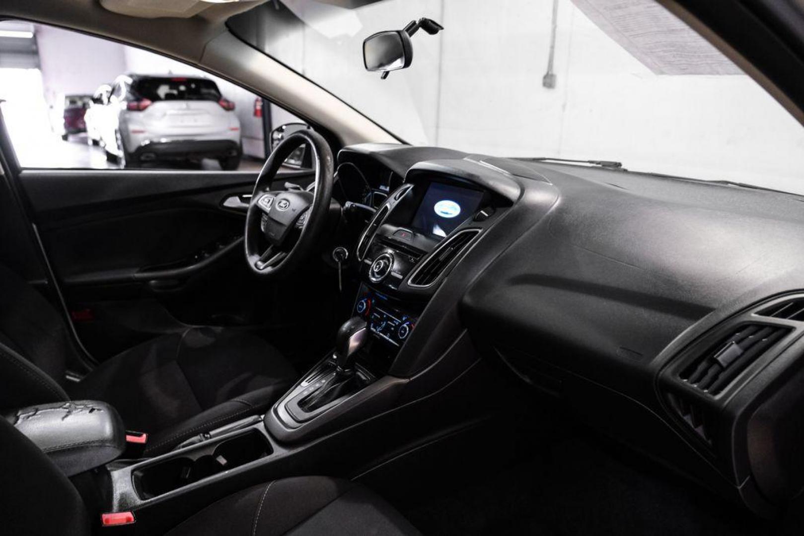 2017 Ingot Silver /Black Ford Focus SEL (1FADP3M23HL) with an 2.0L I4 GDI Ti-VCT Flex Fuel engine, Automatic transmission, located at 15300 Midway Rd., Addison, TX, 75001, (972) 702-0011, 32.958321, -96.838074 - Photo#14