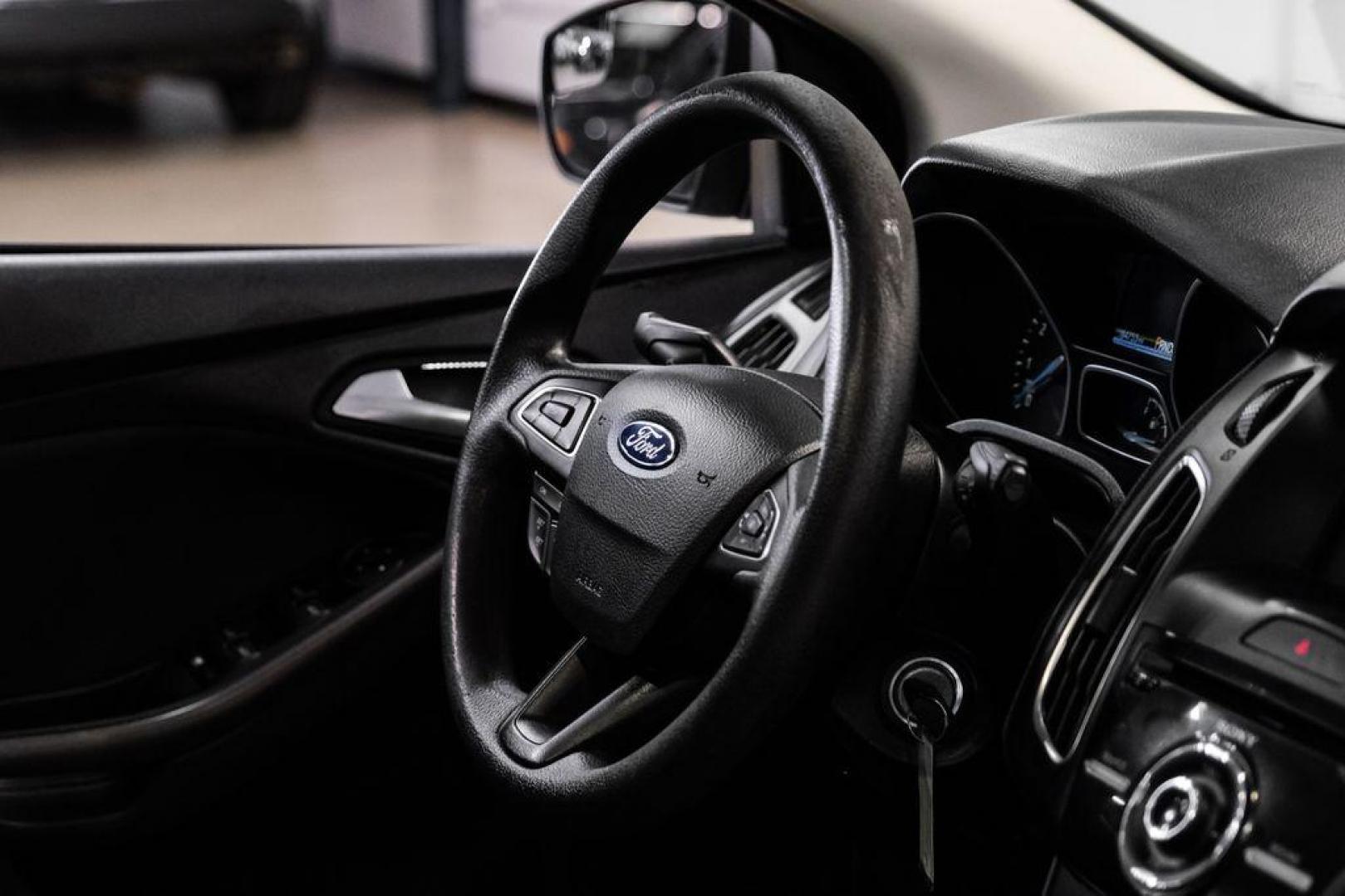 2017 Ingot Silver /Black Ford Focus SEL (1FADP3M23HL) with an 2.0L I4 GDI Ti-VCT Flex Fuel engine, Automatic transmission, located at 15300 Midway Rd., Addison, TX, 75001, (972) 702-0011, 32.958321, -96.838074 - Photo#15