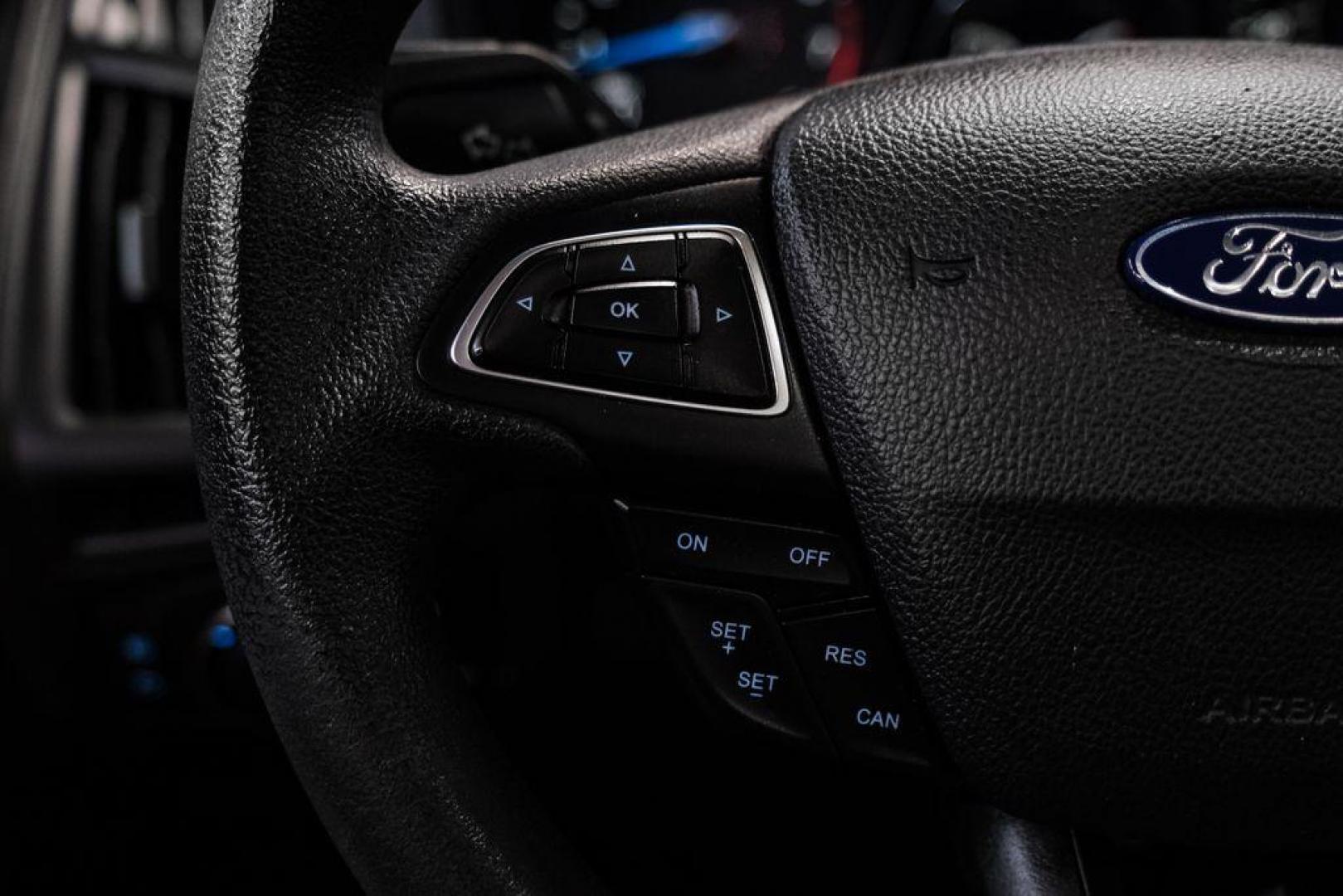 2017 Ingot Silver /Black Ford Focus SEL (1FADP3M23HL) with an 2.0L I4 GDI Ti-VCT Flex Fuel engine, Automatic transmission, located at 15300 Midway Rd., Addison, TX, 75001, (972) 702-0011, 32.958321, -96.838074 - Photo#16