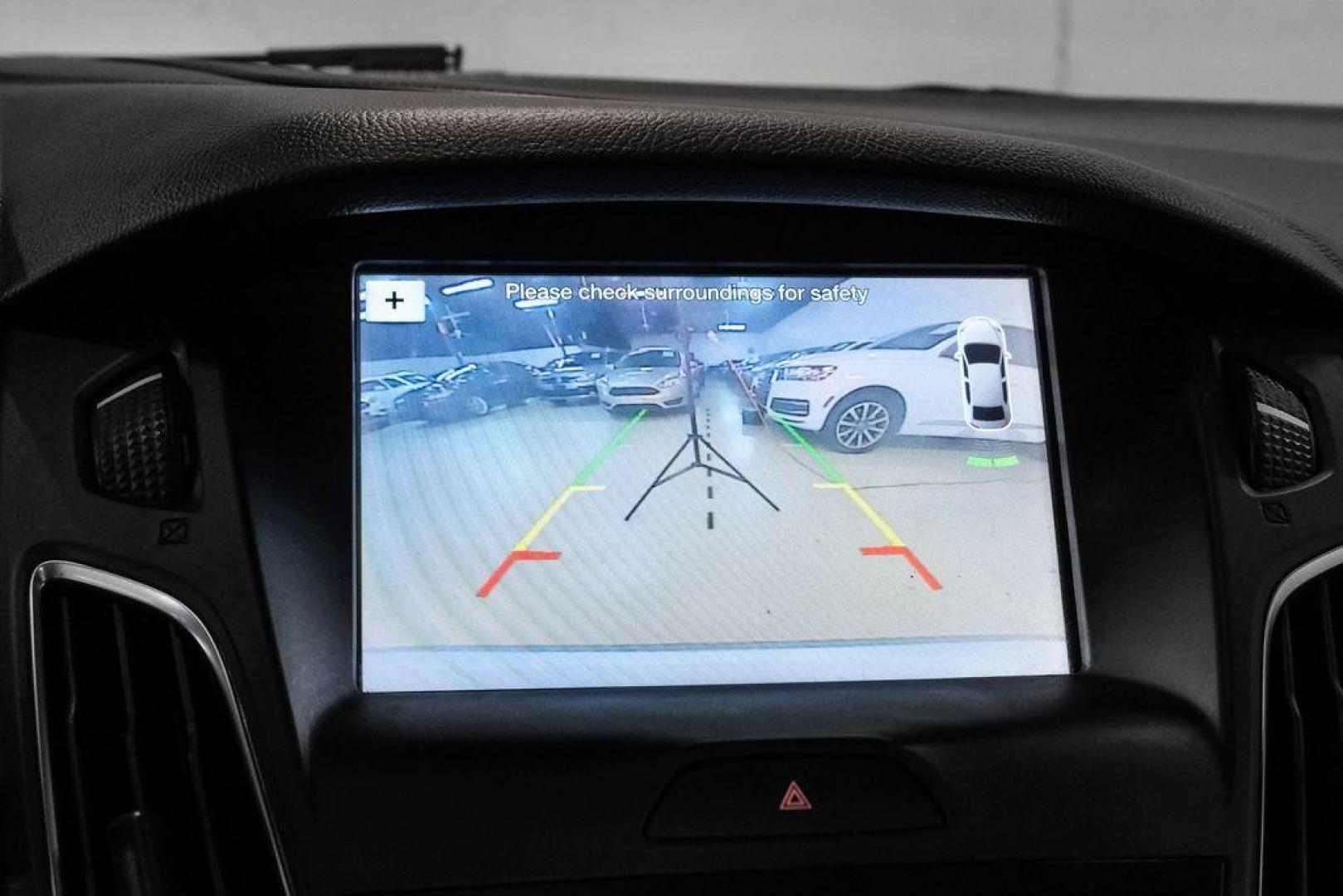 2017 Ingot Silver /Black Ford Focus SEL (1FADP3M23HL) with an 2.0L I4 GDI Ti-VCT Flex Fuel engine, Automatic transmission, located at 15300 Midway Rd., Addison, TX, 75001, (972) 702-0011, 32.958321, -96.838074 - Photo#20