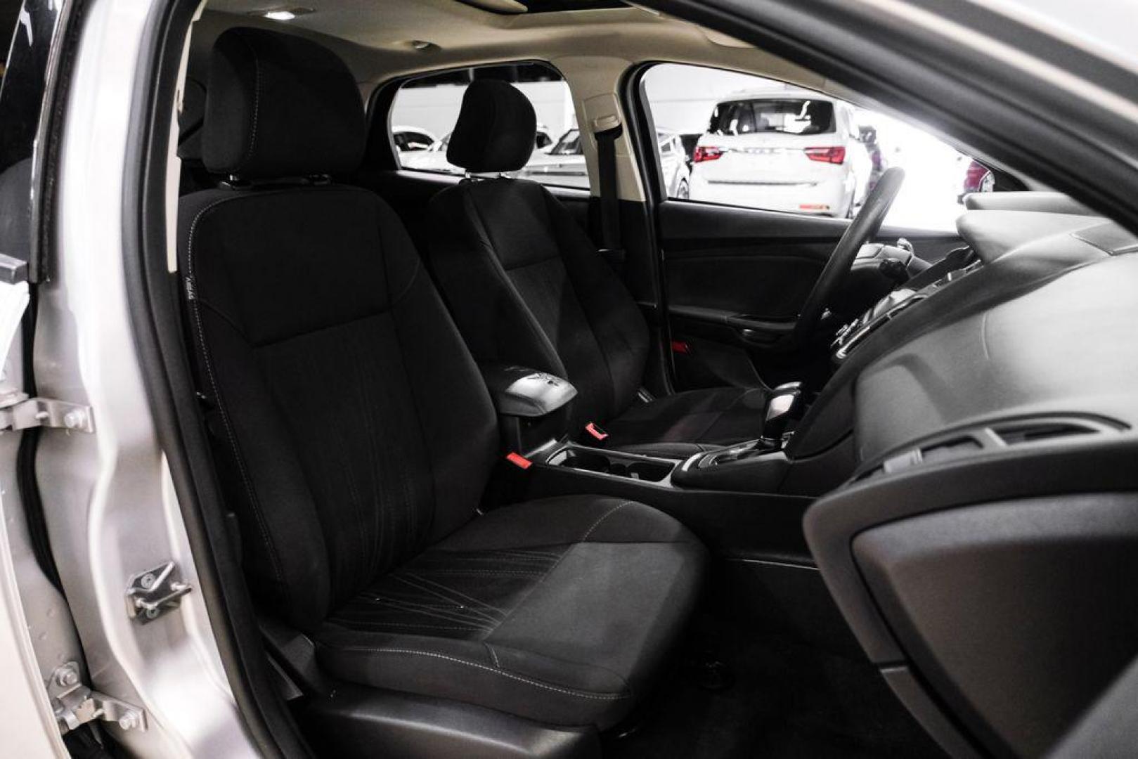 2017 Ingot Silver /Black Ford Focus SEL (1FADP3M23HL) with an 2.0L I4 GDI Ti-VCT Flex Fuel engine, Automatic transmission, located at 15300 Midway Rd., Addison, TX, 75001, (972) 702-0011, 32.958321, -96.838074 - Photo#29