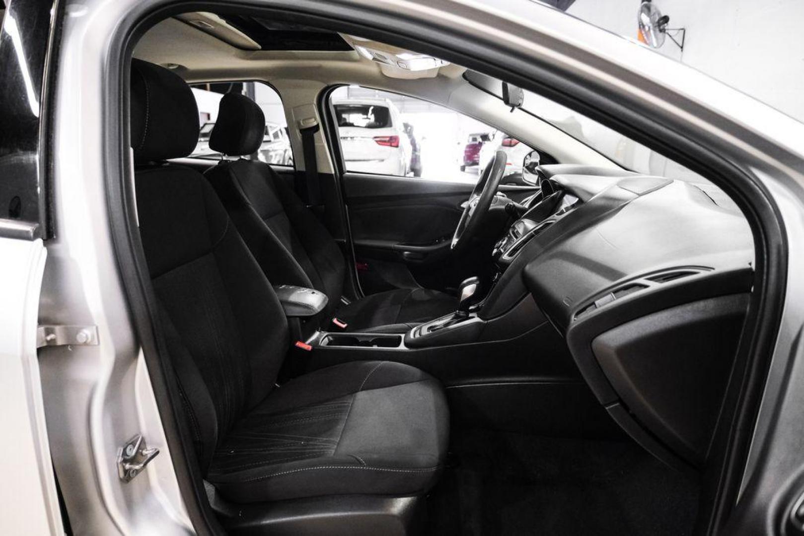 2017 Ingot Silver /Black Ford Focus SEL (1FADP3M23HL) with an 2.0L I4 GDI Ti-VCT Flex Fuel engine, Automatic transmission, located at 15300 Midway Rd., Addison, TX, 75001, (972) 702-0011, 32.958321, -96.838074 - Photo#30