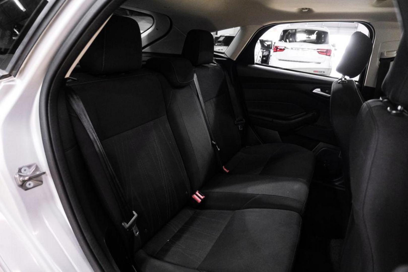 2017 Ingot Silver /Black Ford Focus SEL (1FADP3M23HL) with an 2.0L I4 GDI Ti-VCT Flex Fuel engine, Automatic transmission, located at 15300 Midway Rd., Addison, TX, 75001, (972) 702-0011, 32.958321, -96.838074 - Photo#31