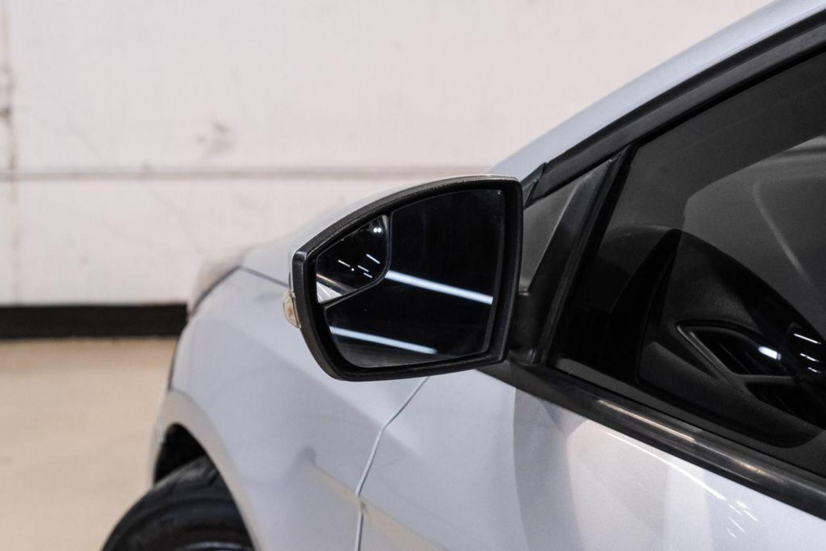 2017 Ingot Silver /Black Ford Focus SEL (1FADP3M23HL) with an 2.0L I4 GDI Ti-VCT Flex Fuel engine, Automatic transmission, located at 15300 Midway Rd., Addison, TX, 75001, (972) 702-0011, 32.958321, -96.838074 - Photo#36