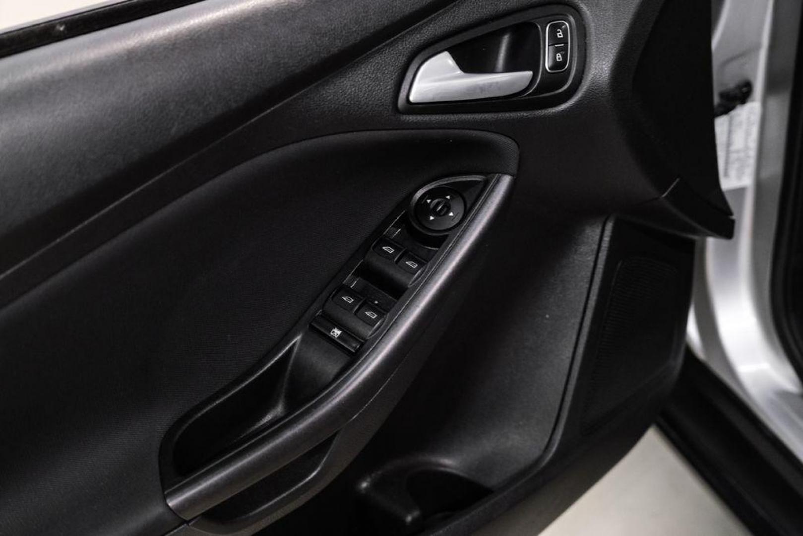 2017 Ingot Silver /Black Ford Focus SEL (1FADP3M23HL) with an 2.0L I4 GDI Ti-VCT Flex Fuel engine, Automatic transmission, located at 15300 Midway Rd., Addison, TX, 75001, (972) 702-0011, 32.958321, -96.838074 - Photo#38