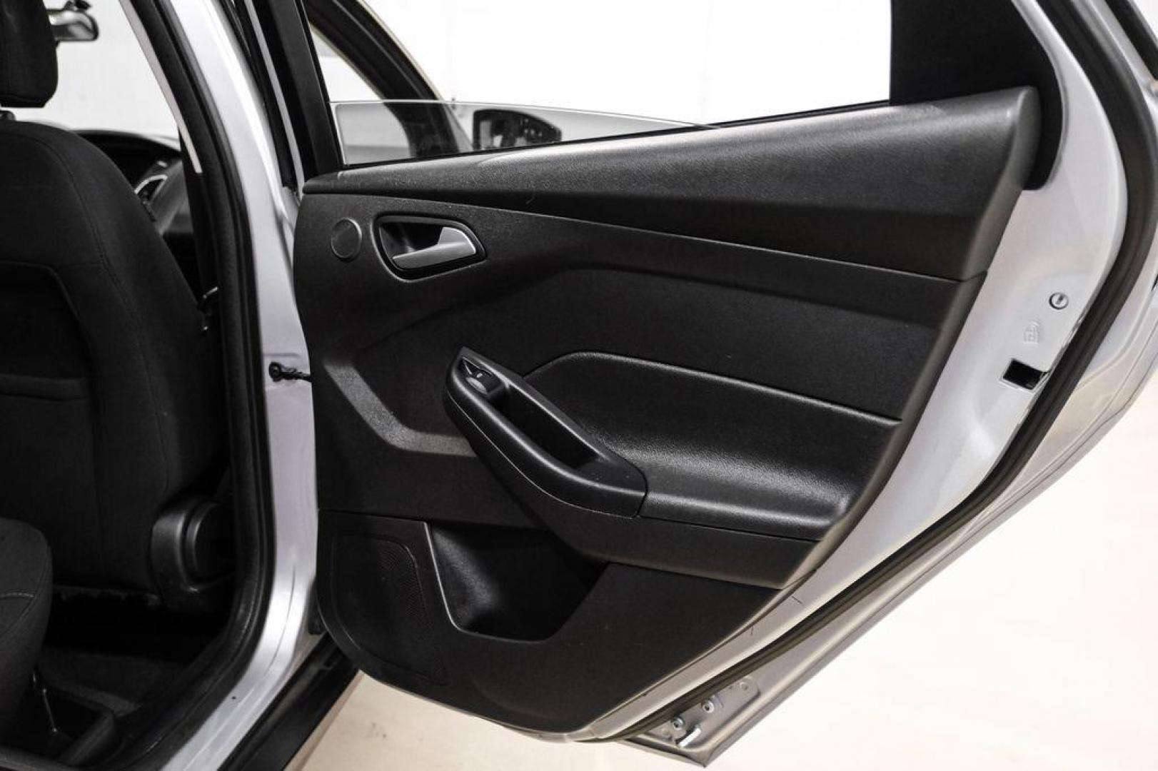 2017 Ingot Silver /Black Ford Focus SEL (1FADP3M23HL) with an 2.0L I4 GDI Ti-VCT Flex Fuel engine, Automatic transmission, located at 15300 Midway Rd., Addison, TX, 75001, (972) 702-0011, 32.958321, -96.838074 - Photo#41