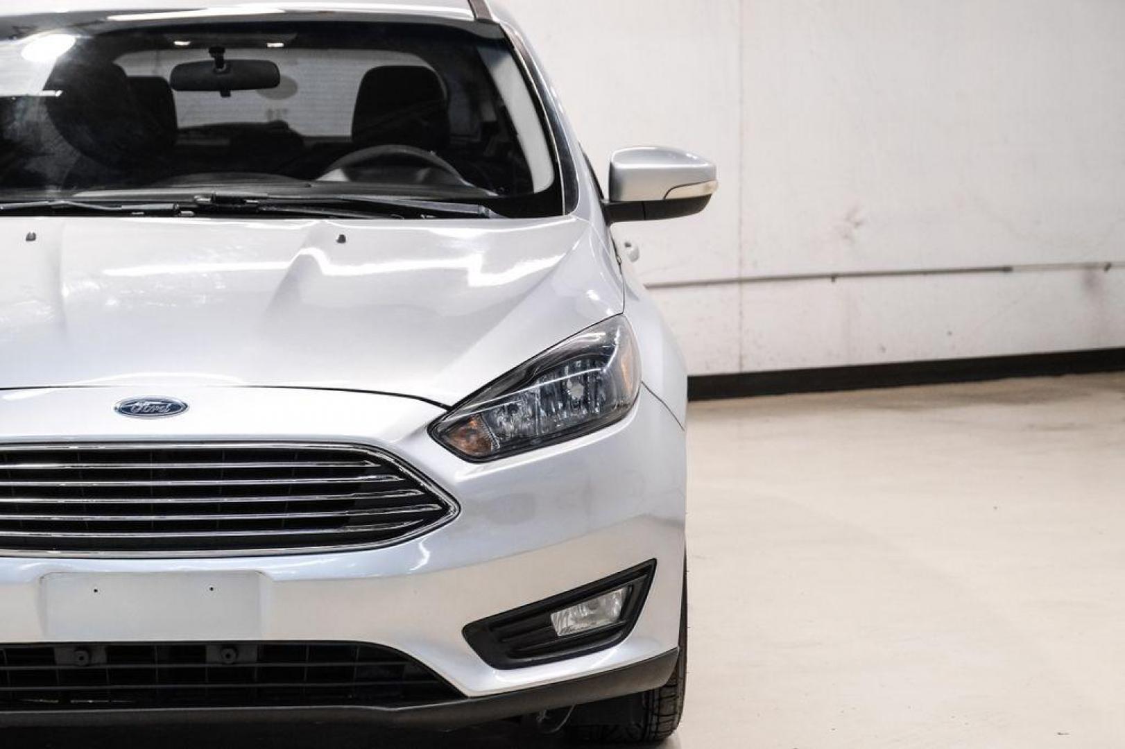 2017 Ingot Silver /Black Ford Focus SEL (1FADP3M23HL) with an 2.0L I4 GDI Ti-VCT Flex Fuel engine, Automatic transmission, located at 15300 Midway Rd., Addison, TX, 75001, (972) 702-0011, 32.958321, -96.838074 - Photo#42