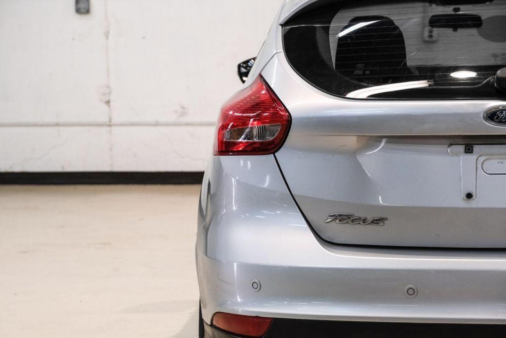 2017 Ingot Silver /Black Ford Focus SEL (1FADP3M23HL) with an 2.0L I4 GDI Ti-VCT Flex Fuel engine, Automatic transmission, located at 15300 Midway Rd., Addison, TX, 75001, (972) 702-0011, 32.958321, -96.838074 - Photo#43