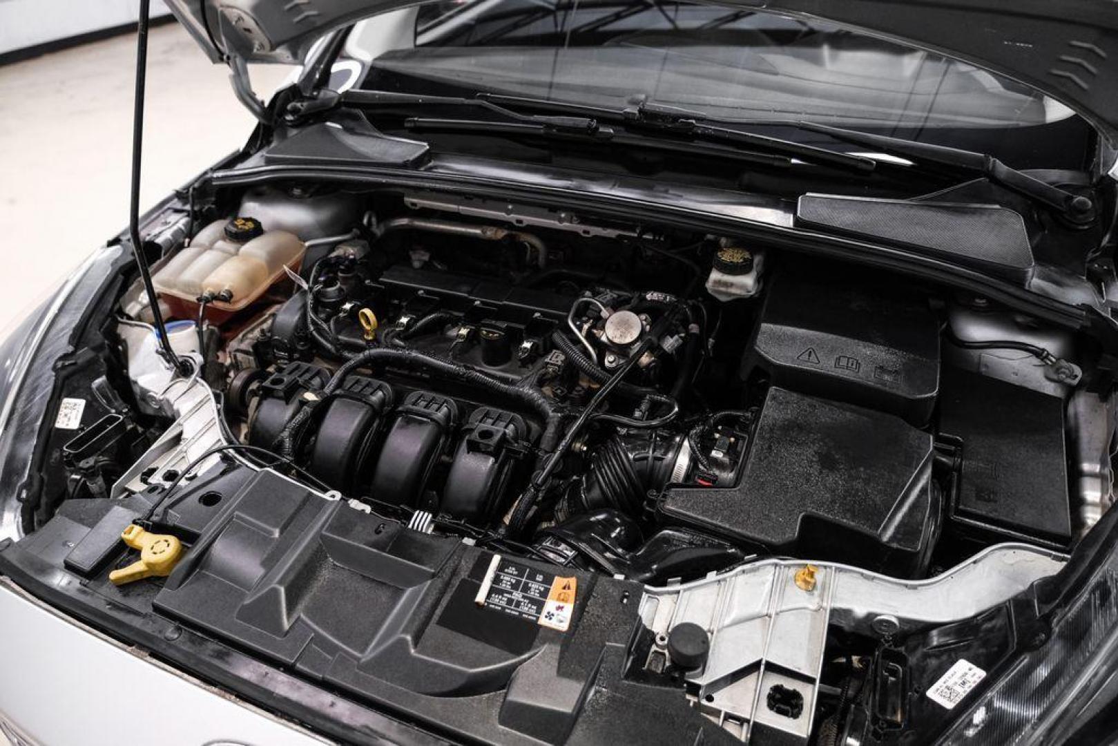 2017 Ingot Silver /Black Ford Focus SEL (1FADP3M23HL) with an 2.0L I4 GDI Ti-VCT Flex Fuel engine, Automatic transmission, located at 15300 Midway Rd., Addison, TX, 75001, (972) 702-0011, 32.958321, -96.838074 - Photo#44