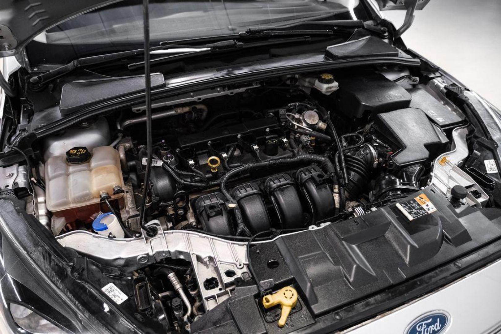 2017 Ingot Silver /Black Ford Focus SEL (1FADP3M23HL) with an 2.0L I4 GDI Ti-VCT Flex Fuel engine, Automatic transmission, located at 15300 Midway Rd., Addison, TX, 75001, (972) 702-0011, 32.958321, -96.838074 - Photo#46