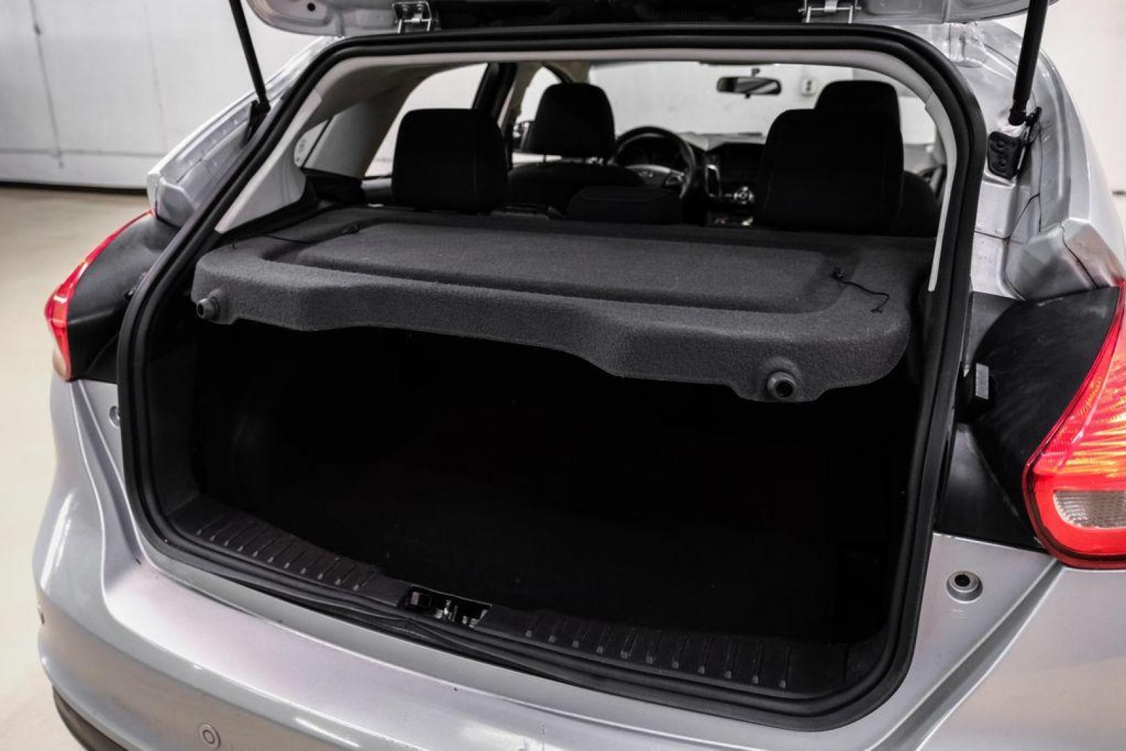 2017 Ingot Silver /Black Ford Focus SEL (1FADP3M23HL) with an 2.0L I4 GDI Ti-VCT Flex Fuel engine, Automatic transmission, located at 15300 Midway Rd., Addison, TX, 75001, (972) 702-0011, 32.958321, -96.838074 - Photo#48