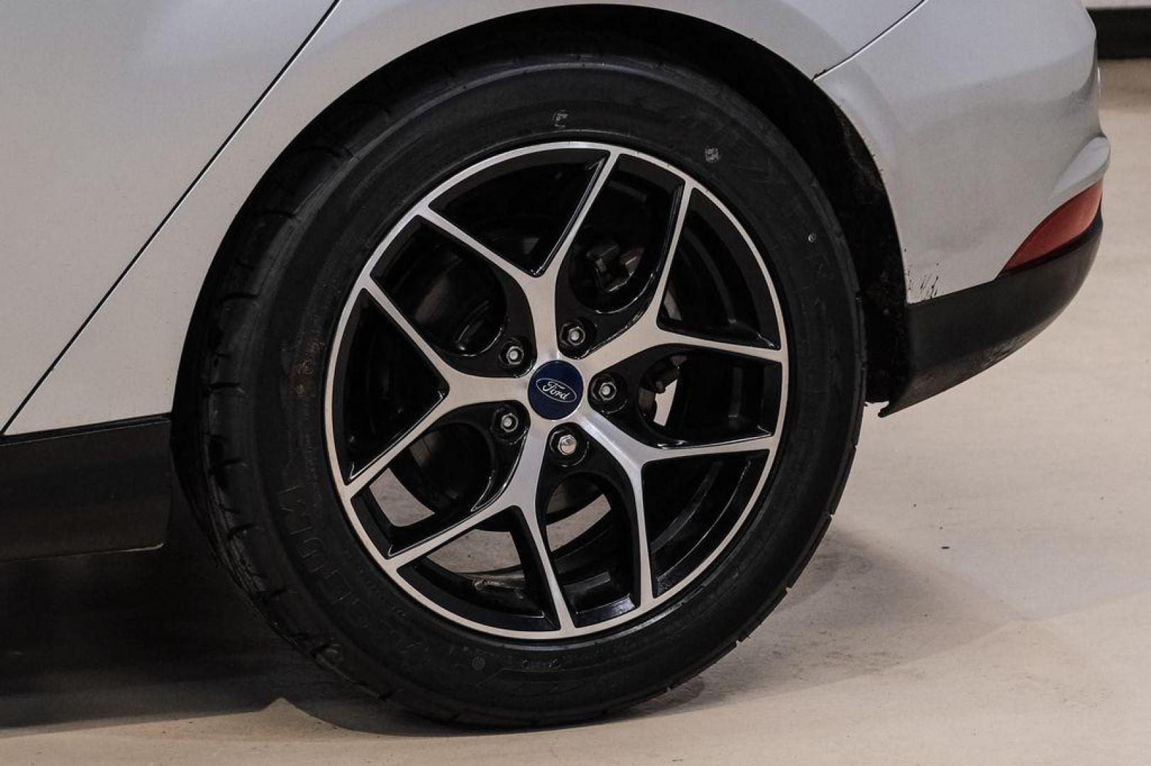 2017 Ingot Silver /Black Ford Focus SEL (1FADP3M23HL) with an 2.0L I4 GDI Ti-VCT Flex Fuel engine, Automatic transmission, located at 15300 Midway Rd., Addison, TX, 75001, (972) 702-0011, 32.958321, -96.838074 - Photo#50