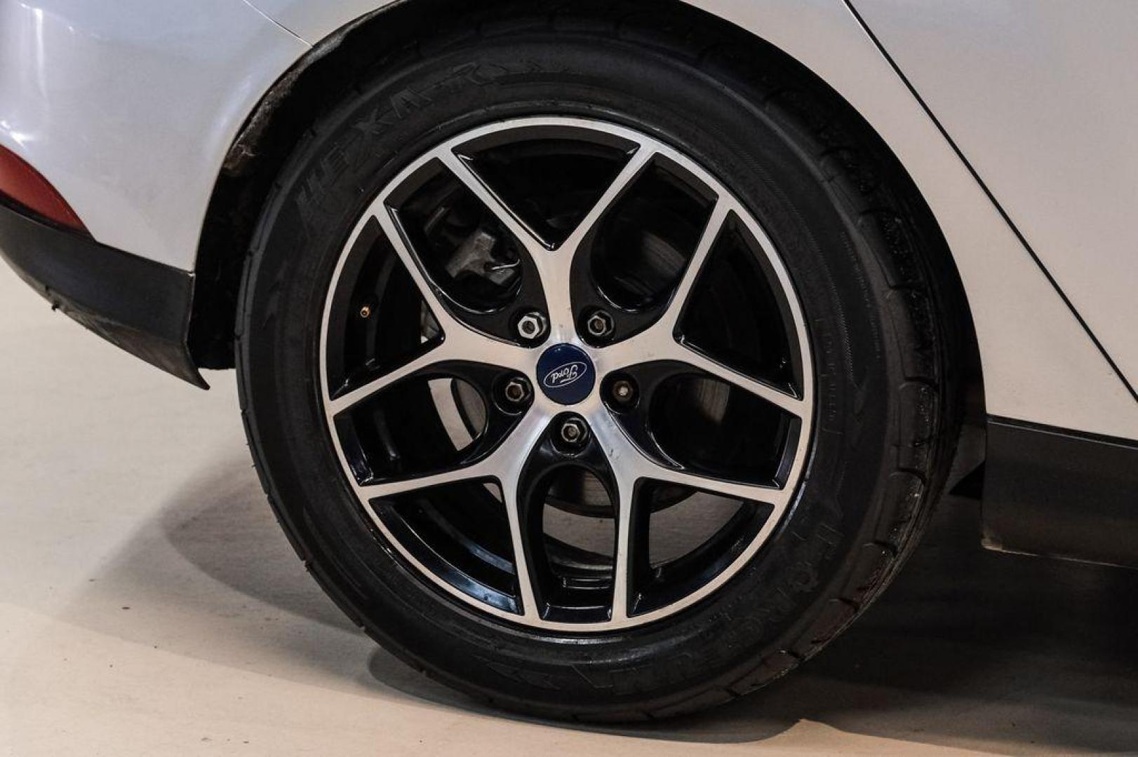 2017 Ingot Silver /Black Ford Focus SEL (1FADP3M23HL) with an 2.0L I4 GDI Ti-VCT Flex Fuel engine, Automatic transmission, located at 15300 Midway Rd., Addison, TX, 75001, (972) 702-0011, 32.958321, -96.838074 - Photo#51