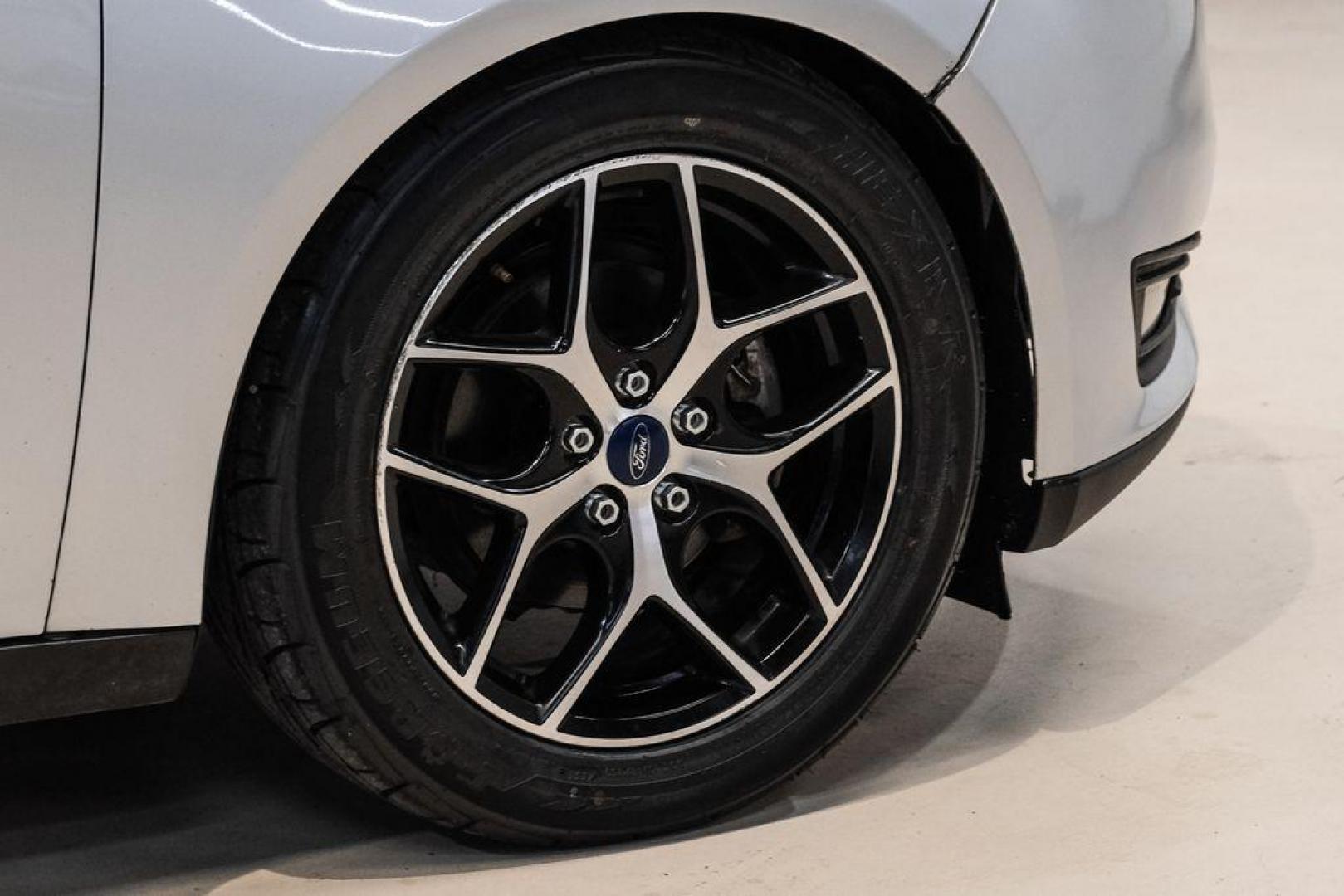 2017 Ingot Silver /Black Ford Focus SEL (1FADP3M23HL) with an 2.0L I4 GDI Ti-VCT Flex Fuel engine, Automatic transmission, located at 15300 Midway Rd., Addison, TX, 75001, (972) 702-0011, 32.958321, -96.838074 - Photo#52