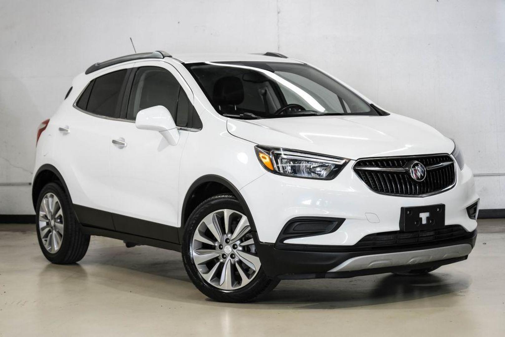 2020 Summit White /Ebony Buick Encore Preferred (KL4CJASB8LB) with an ECOTEC 1.4L I4 SMPI DOHC Turbocharged VVT engine, Automatic transmission, located at 15300 Midway Rd., Addison, TX, 75001, (972) 702-0011, 32.958321, -96.838074 - Photo#7