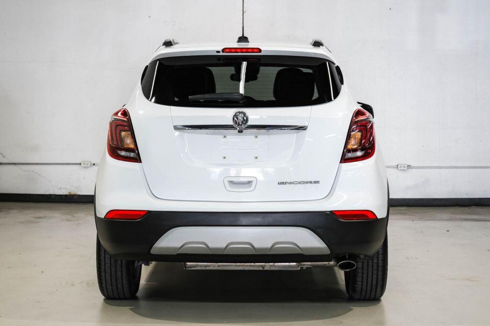 2020 Summit White /Ebony Buick Encore Preferred (KL4CJASB8LB) with an ECOTEC 1.4L I4 SMPI DOHC Turbocharged VVT engine, Automatic transmission, located at 15300 Midway Rd., Addison, TX, 75001, (972) 702-0011, 32.958321, -96.838074 - Photo#10