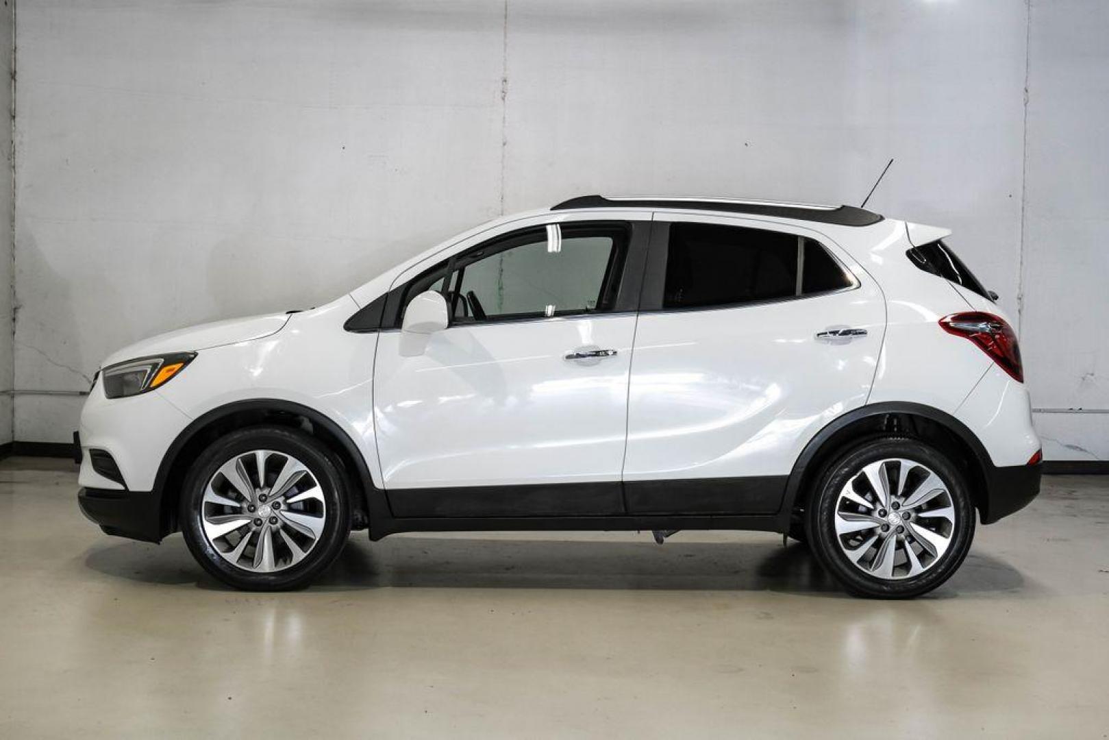 2020 Summit White /Ebony Buick Encore Preferred (KL4CJASB8LB) with an ECOTEC 1.4L I4 SMPI DOHC Turbocharged VVT engine, Automatic transmission, located at 15300 Midway Rd., Addison, TX, 75001, (972) 702-0011, 32.958321, -96.838074 - Photo#14