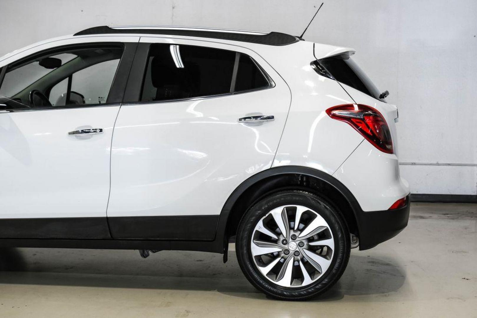 2020 Summit White /Ebony Buick Encore Preferred (KL4CJASB8LB) with an ECOTEC 1.4L I4 SMPI DOHC Turbocharged VVT engine, Automatic transmission, located at 15300 Midway Rd., Addison, TX, 75001, (972) 702-0011, 32.958321, -96.838074 - Photo#16