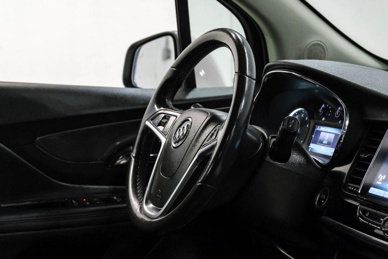 2020 Summit White /Ebony Buick Encore Preferred (KL4CJASB8LB) with an ECOTEC 1.4L I4 SMPI DOHC Turbocharged VVT engine, Automatic transmission, located at 15300 Midway Rd., Addison, TX, 75001, (972) 702-0011, 32.958321, -96.838074 - Photo#19