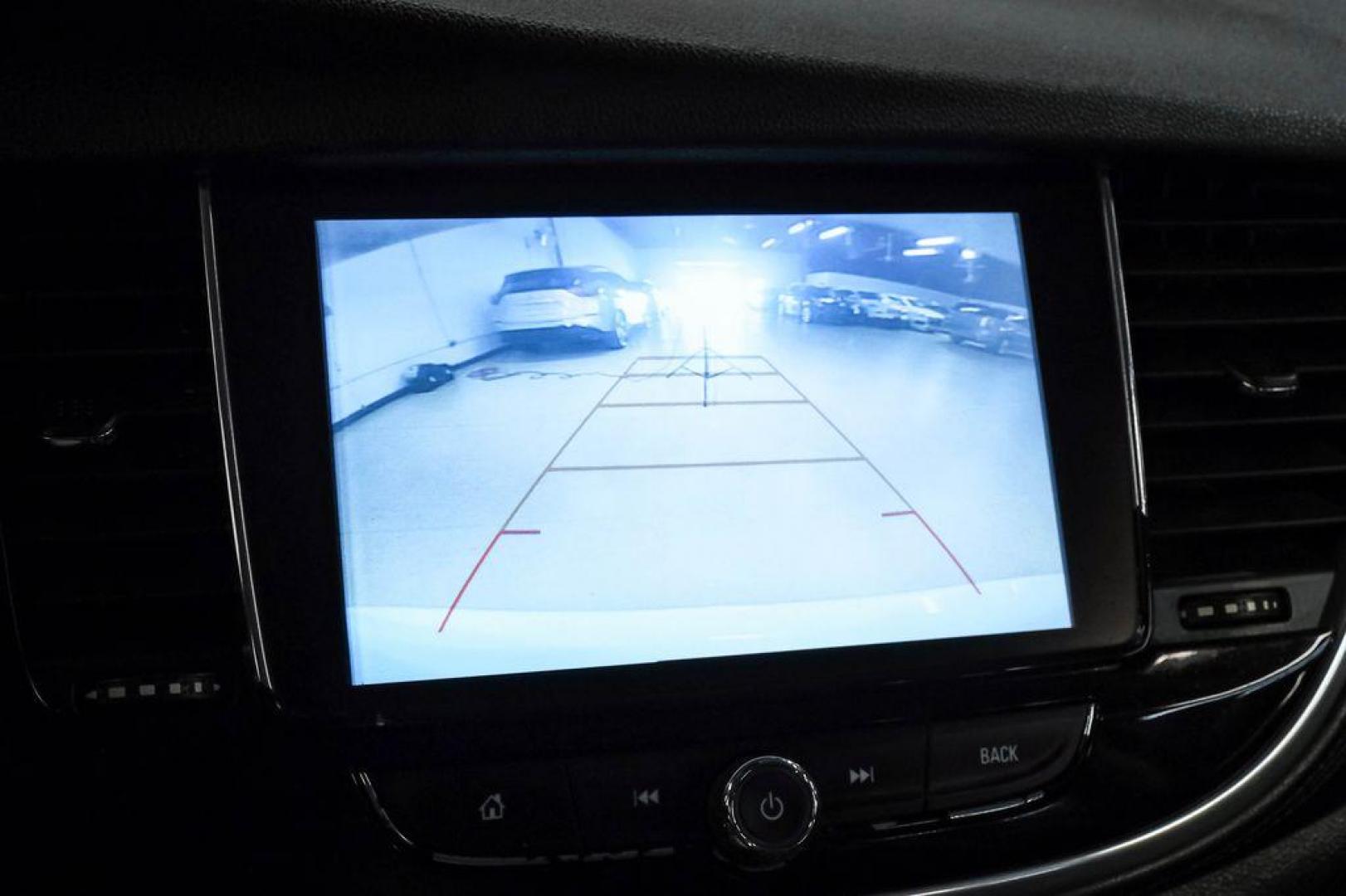 2020 Summit White /Ebony Buick Encore Preferred (KL4CJASB8LB) with an ECOTEC 1.4L I4 SMPI DOHC Turbocharged VVT engine, Automatic transmission, located at 15300 Midway Rd., Addison, TX, 75001, (972) 702-0011, 32.958321, -96.838074 - Photo#24