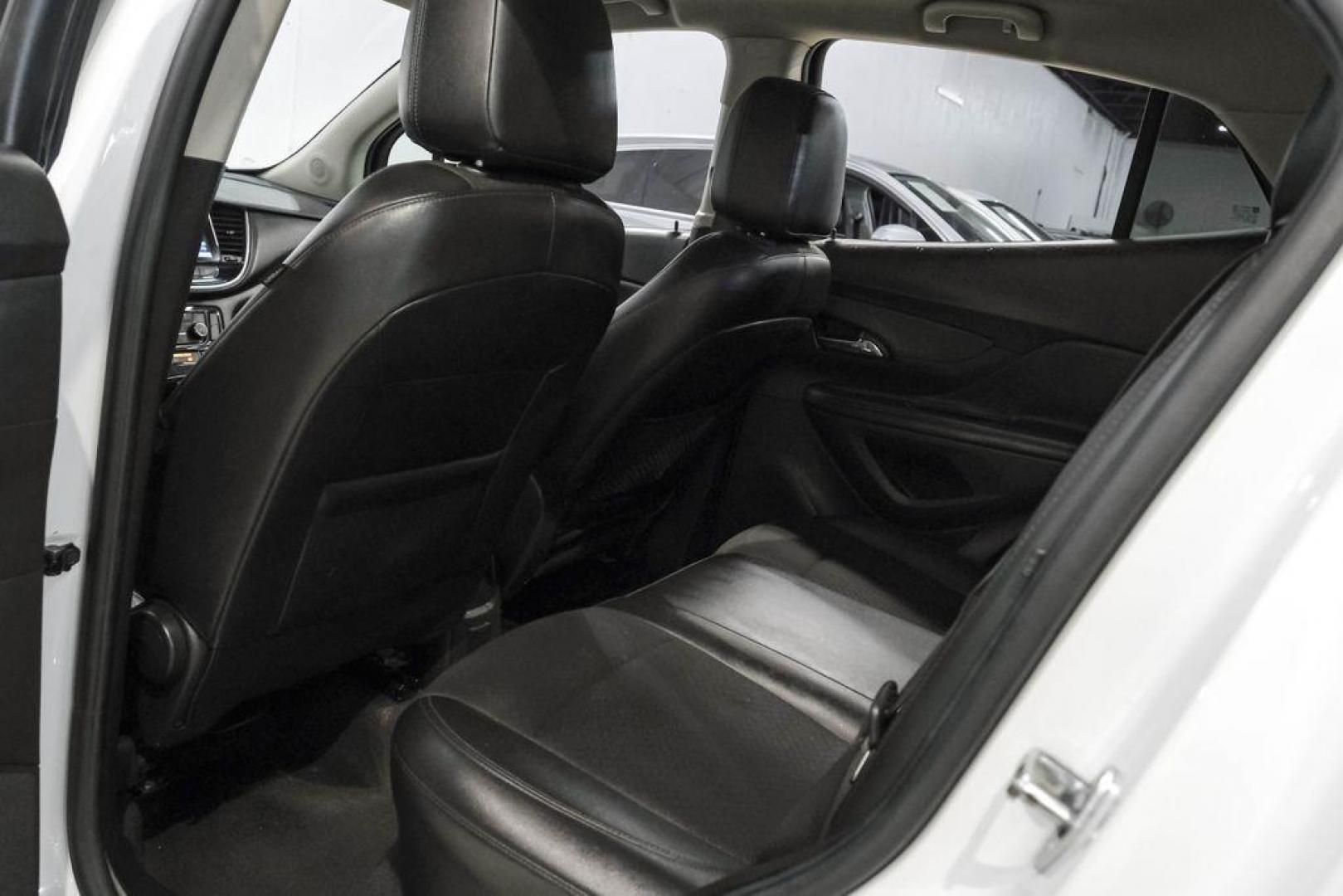 2020 Summit White /Ebony Buick Encore Preferred (KL4CJASB8LB) with an ECOTEC 1.4L I4 SMPI DOHC Turbocharged VVT engine, Automatic transmission, located at 15300 Midway Rd., Addison, TX, 75001, (972) 702-0011, 32.958321, -96.838074 - Photo#37