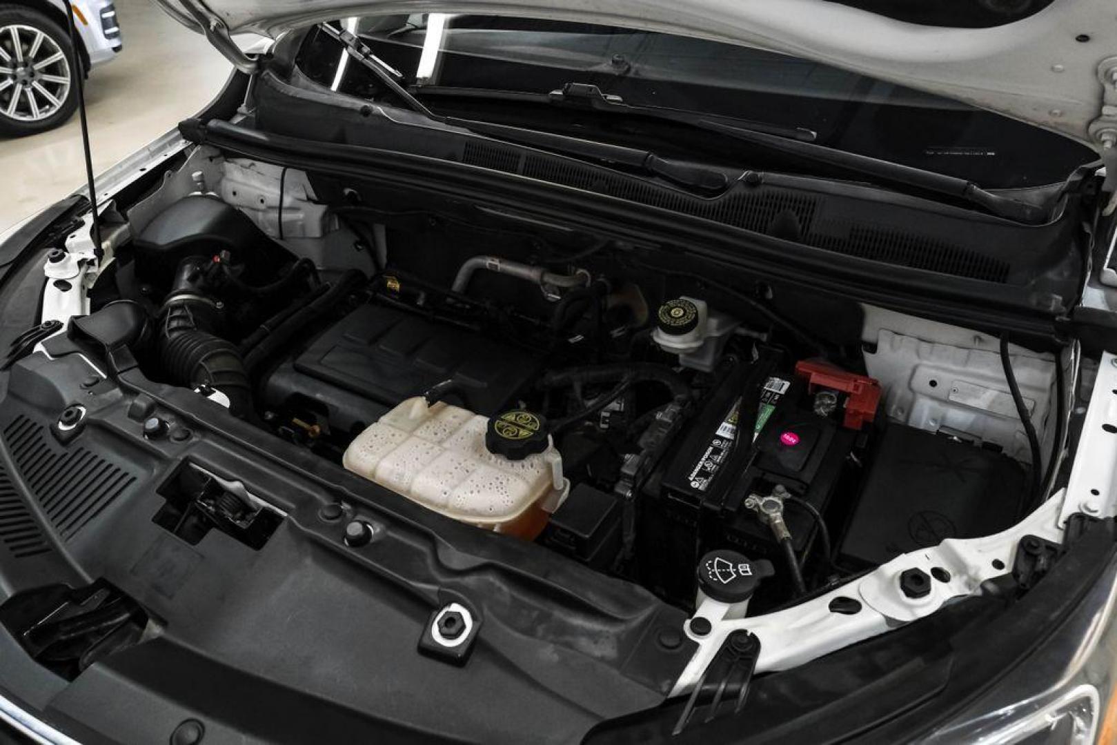 2020 Summit White /Ebony Buick Encore Preferred (KL4CJASB8LB) with an ECOTEC 1.4L I4 SMPI DOHC Turbocharged VVT engine, Automatic transmission, located at 15300 Midway Rd., Addison, TX, 75001, (972) 702-0011, 32.958321, -96.838074 - Photo#49