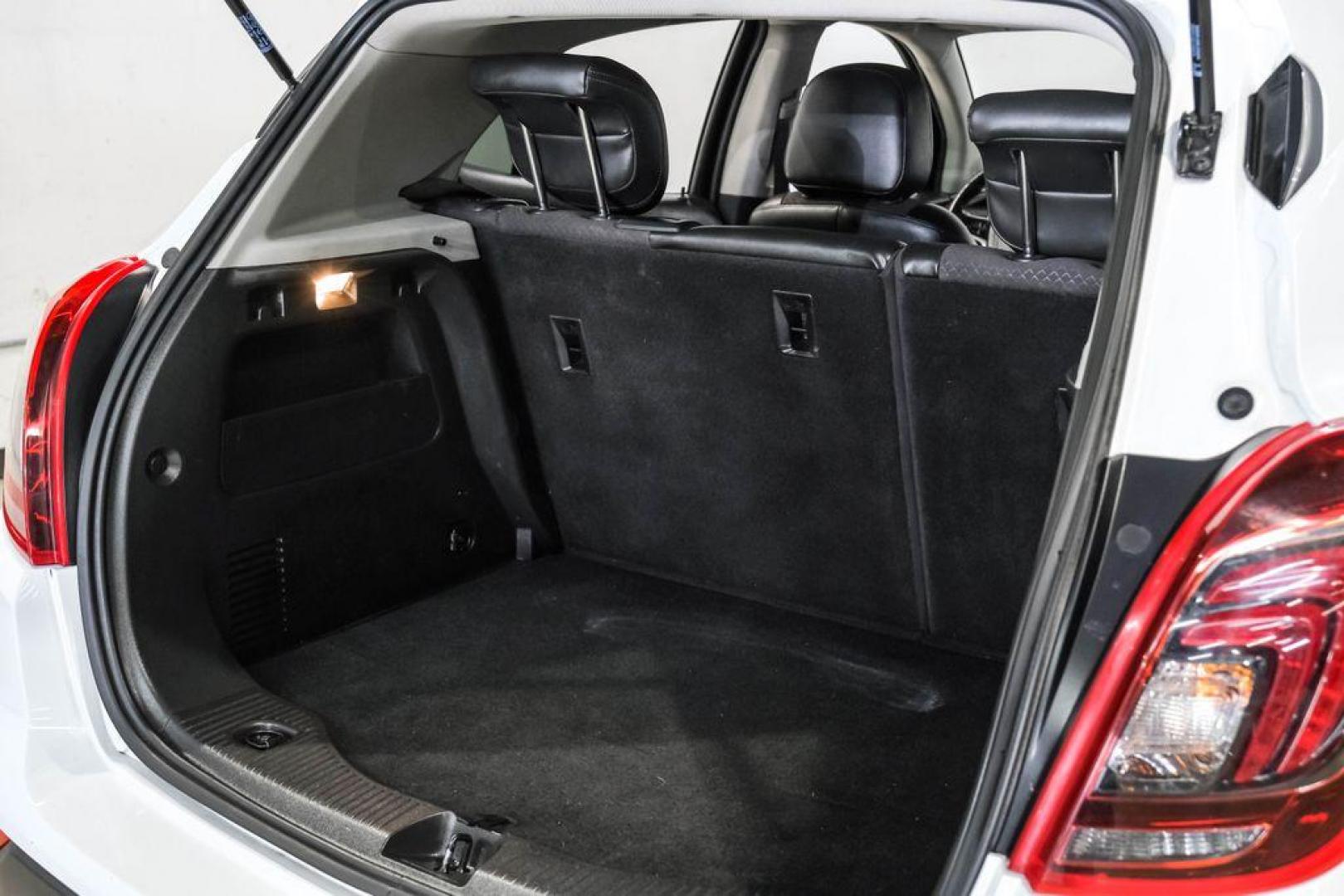 2020 Summit White /Ebony Buick Encore Preferred (KL4CJASB8LB) with an ECOTEC 1.4L I4 SMPI DOHC Turbocharged VVT engine, Automatic transmission, located at 15300 Midway Rd., Addison, TX, 75001, (972) 702-0011, 32.958321, -96.838074 - Photo#52