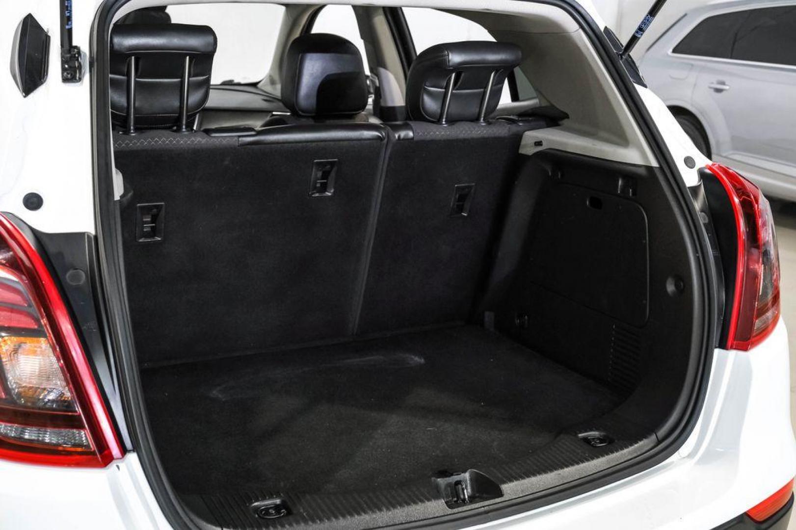 2020 Summit White /Ebony Buick Encore Preferred (KL4CJASB8LB) with an ECOTEC 1.4L I4 SMPI DOHC Turbocharged VVT engine, Automatic transmission, located at 15300 Midway Rd., Addison, TX, 75001, (972) 702-0011, 32.958321, -96.838074 - Photo#53