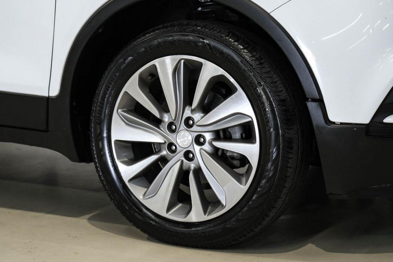 2020 Summit White /Ebony Buick Encore Preferred (KL4CJASB8LB) with an ECOTEC 1.4L I4 SMPI DOHC Turbocharged VVT engine, Automatic transmission, located at 15300 Midway Rd., Addison, TX, 75001, (972) 702-0011, 32.958321, -96.838074 - Photo#55