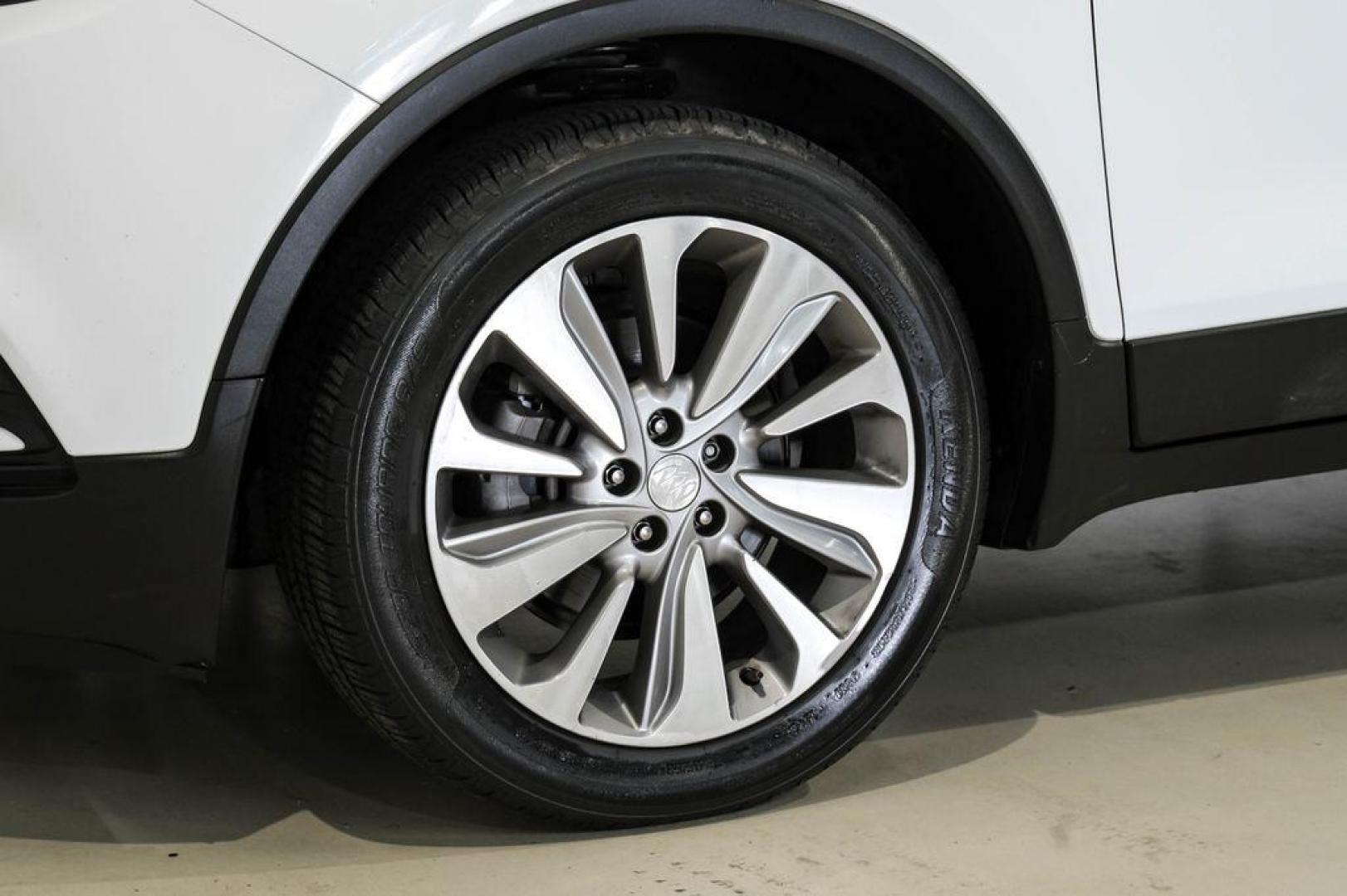 2020 Summit White /Ebony Buick Encore Preferred (KL4CJASB8LB) with an ECOTEC 1.4L I4 SMPI DOHC Turbocharged VVT engine, Automatic transmission, located at 15300 Midway Rd., Addison, TX, 75001, (972) 702-0011, 32.958321, -96.838074 - Photo#56