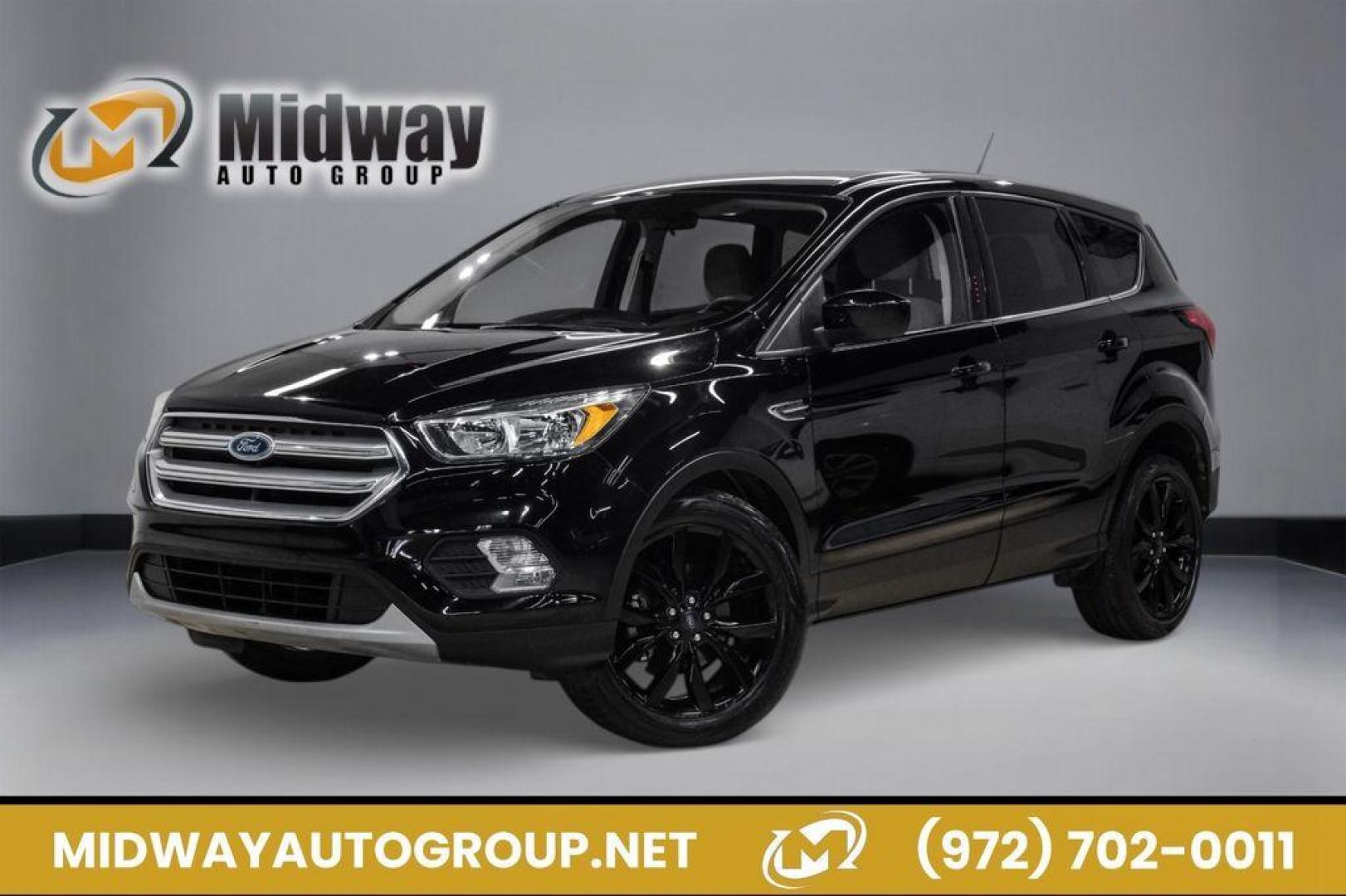 2019 Black /Medium Light Stone Ford Escape SE (1FMCU0GD2KU) with an 1.5L EcoBoost engine, Automatic transmission, located at 15300 Midway Rd., Addison, TX, 75001, (972) 702-0011, 32.958321, -96.838074 - Photo#0