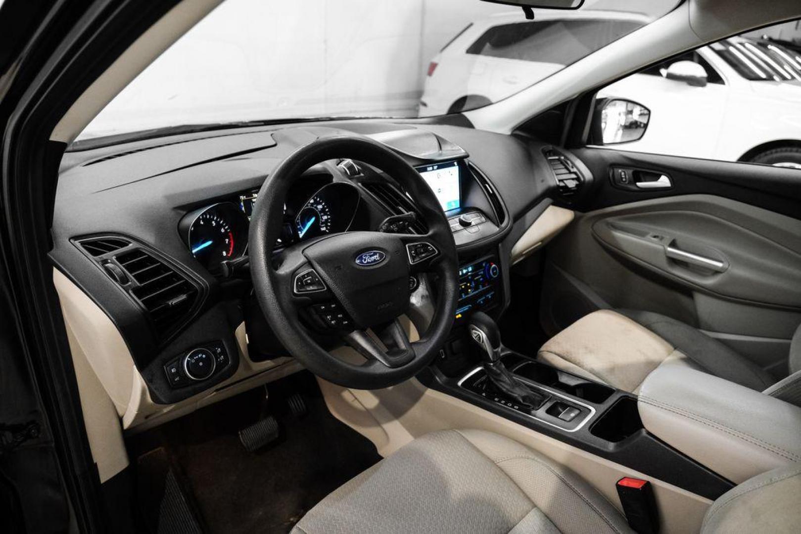 2019 Black /Medium Light Stone Ford Escape SE (1FMCU0GD2KU) with an 1.5L EcoBoost engine, Automatic transmission, located at 15300 Midway Rd., Addison, TX, 75001, (972) 702-0011, 32.958321, -96.838074 - Photo#2