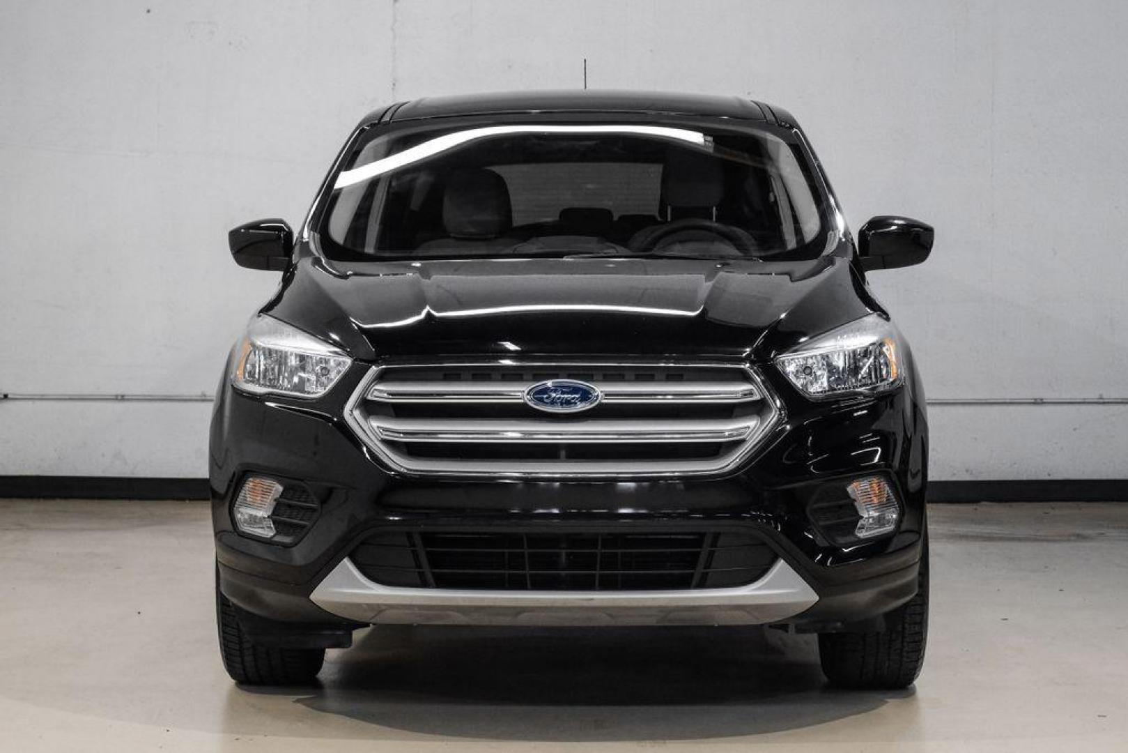 2019 Black /Medium Light Stone Ford Escape SE (1FMCU0GD2KU) with an 1.5L EcoBoost engine, Automatic transmission, located at 15300 Midway Rd., Addison, TX, 75001, (972) 702-0011, 32.958321, -96.838074 - Photo#6