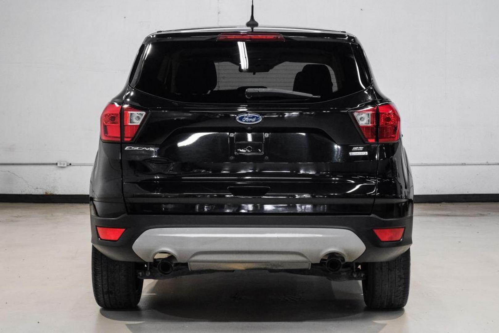 2019 Black /Medium Light Stone Ford Escape SE (1FMCU0GD2KU) with an 1.5L EcoBoost engine, Automatic transmission, located at 15300 Midway Rd., Addison, TX, 75001, (972) 702-0011, 32.958321, -96.838074 - Photo#10