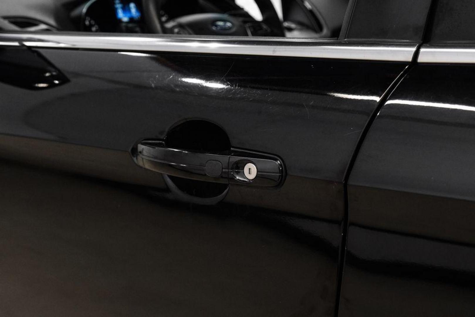 2019 Black /Medium Light Stone Ford Escape SE (1FMCU0GD2KU) with an 1.5L EcoBoost engine, Automatic transmission, located at 15300 Midway Rd., Addison, TX, 75001, (972) 702-0011, 32.958321, -96.838074 - Photo#40