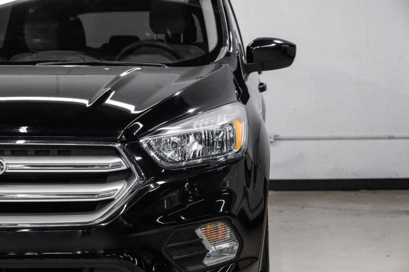 2019 Black /Medium Light Stone Ford Escape SE (1FMCU0GD2KU) with an 1.5L EcoBoost engine, Automatic transmission, located at 15300 Midway Rd., Addison, TX, 75001, (972) 702-0011, 32.958321, -96.838074 - Photo#48