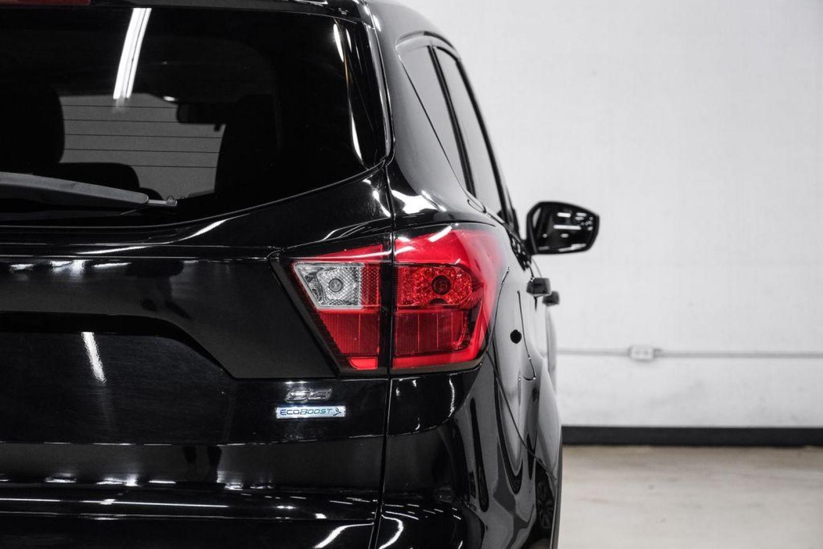 2019 Black /Medium Light Stone Ford Escape SE (1FMCU0GD2KU) with an 1.5L EcoBoost engine, Automatic transmission, located at 15300 Midway Rd., Addison, TX, 75001, (972) 702-0011, 32.958321, -96.838074 - Photo#49