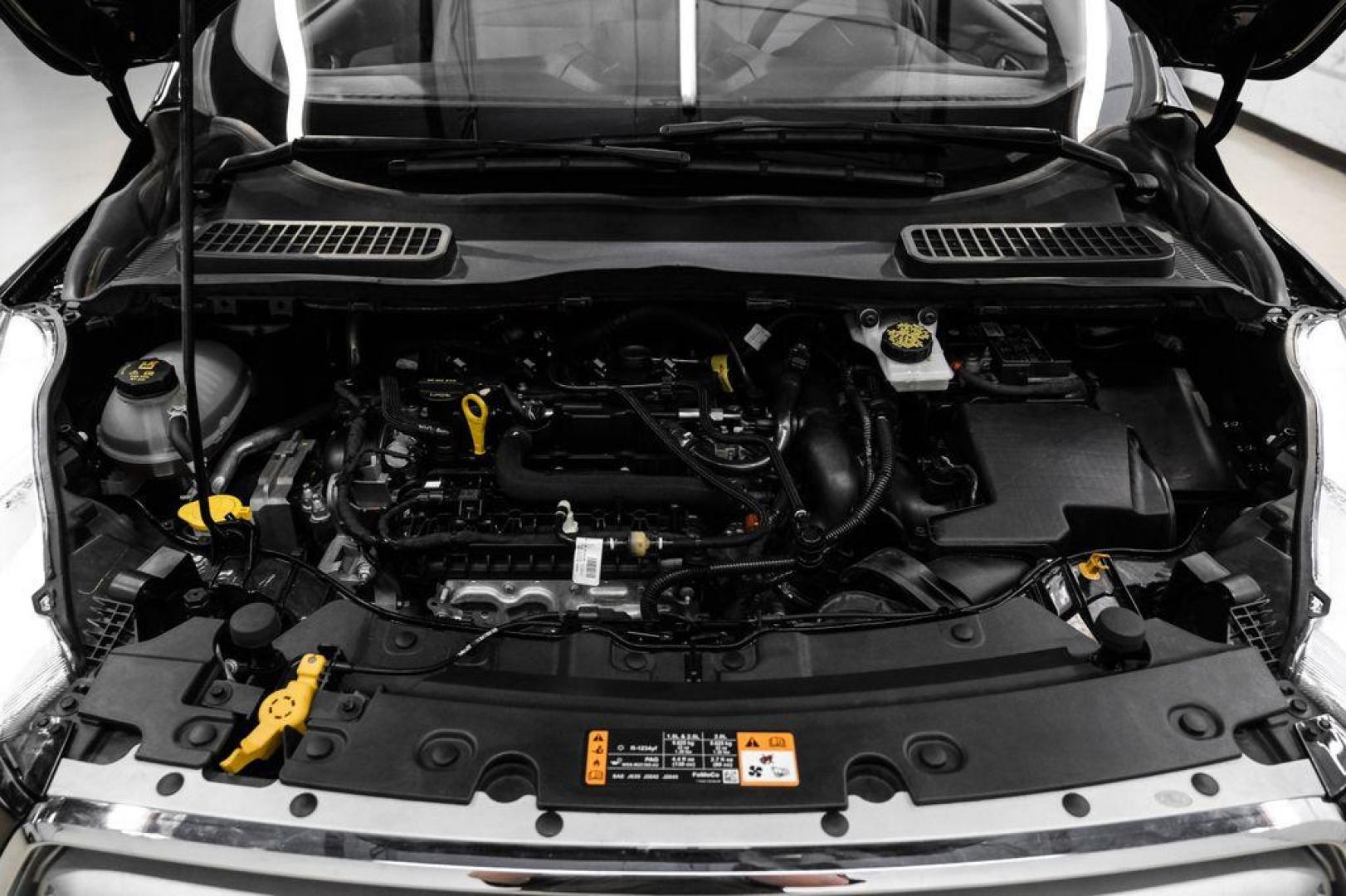 2019 Black /Medium Light Stone Ford Escape SE (1FMCU0GD2KU) with an 1.5L EcoBoost engine, Automatic transmission, located at 15300 Midway Rd., Addison, TX, 75001, (972) 702-0011, 32.958321, -96.838074 - Photo#51