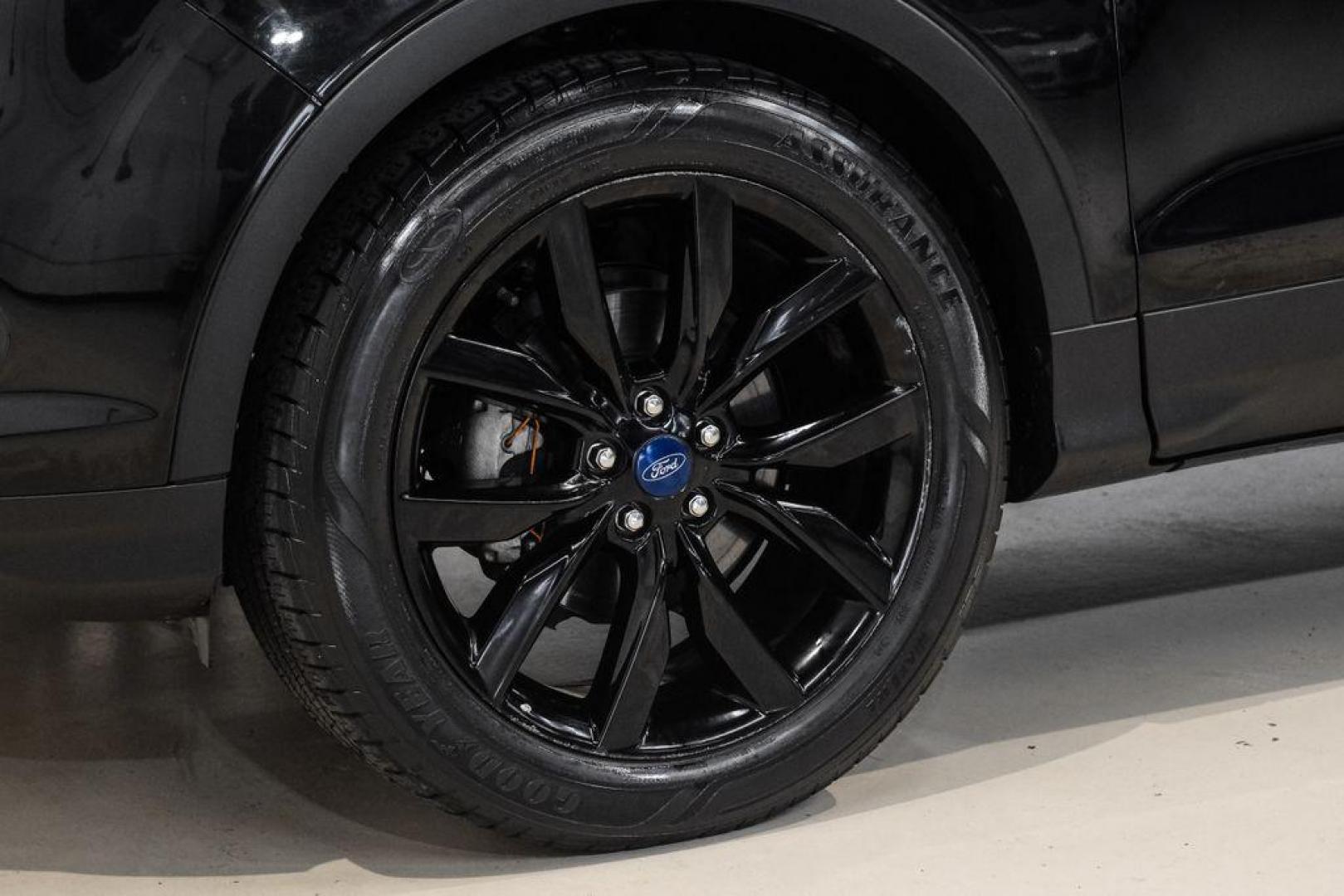 2019 Black /Medium Light Stone Ford Escape SE (1FMCU0GD2KU) with an 1.5L EcoBoost engine, Automatic transmission, located at 15300 Midway Rd., Addison, TX, 75001, (972) 702-0011, 32.958321, -96.838074 - Photo#55