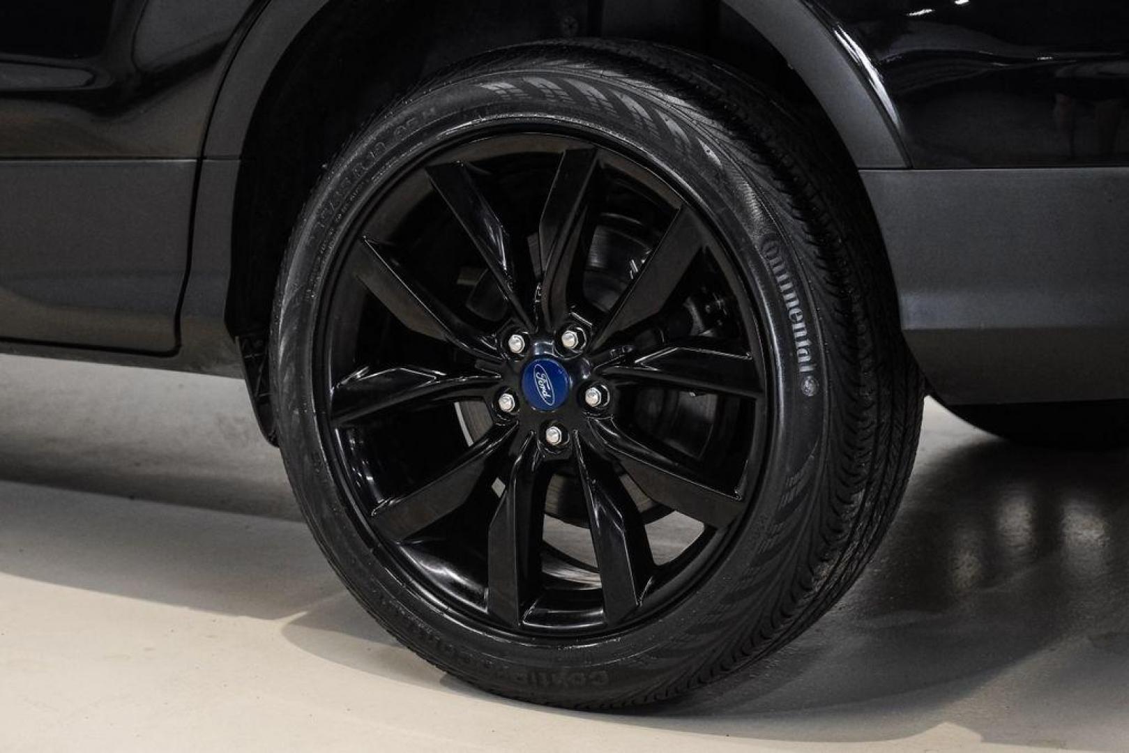 2019 Black /Medium Light Stone Ford Escape SE (1FMCU0GD2KU) with an 1.5L EcoBoost engine, Automatic transmission, located at 15300 Midway Rd., Addison, TX, 75001, (972) 702-0011, 32.958321, -96.838074 - Photo#56